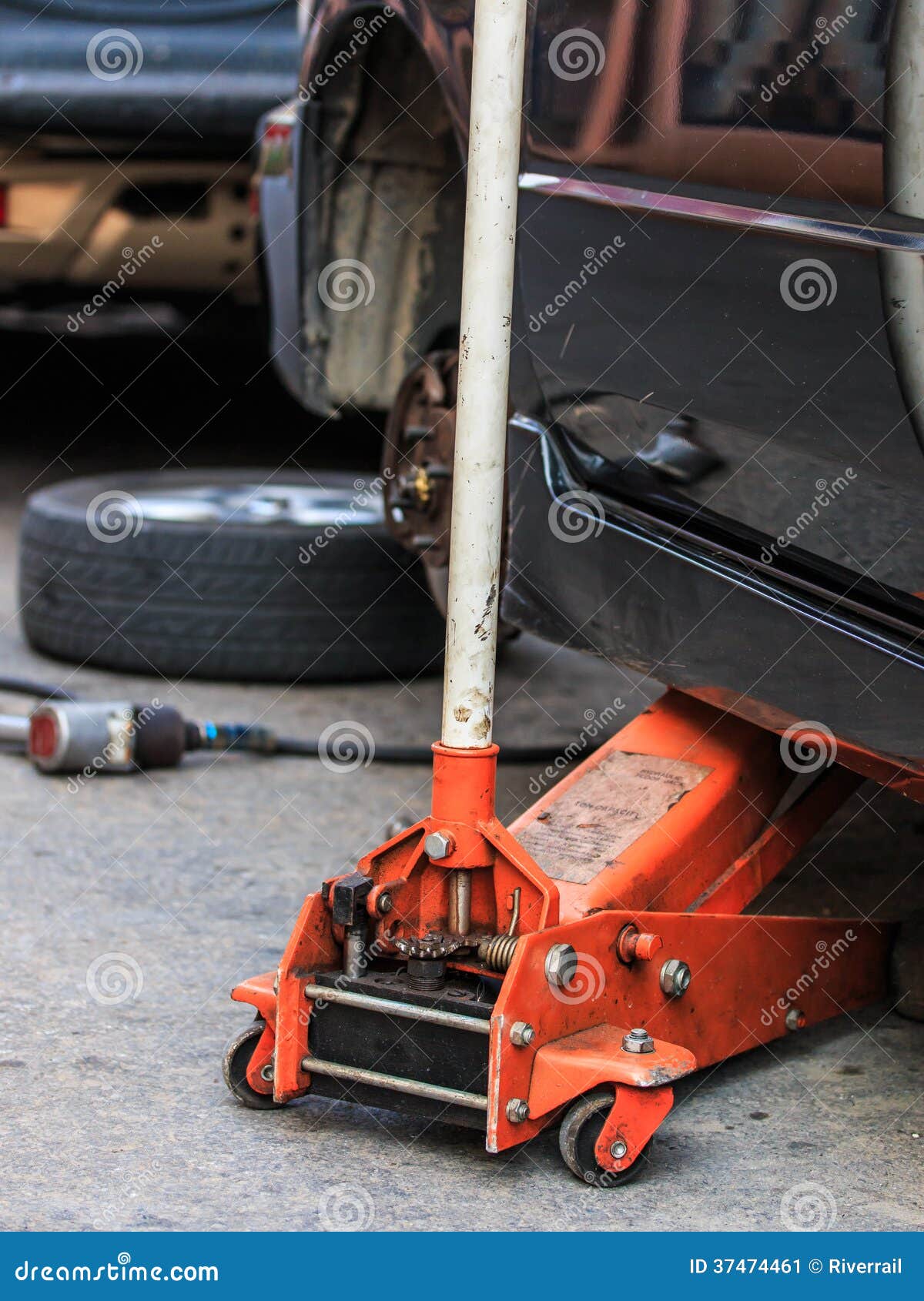 Jacking up the car stock image. Image of abstract, route 37474461