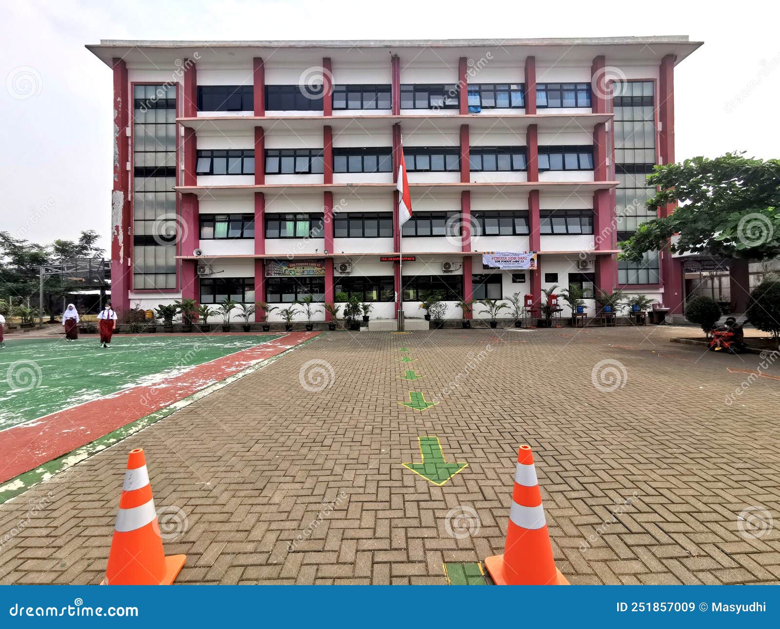 Elementary School Building in Indonesia with a Large Parking Lot