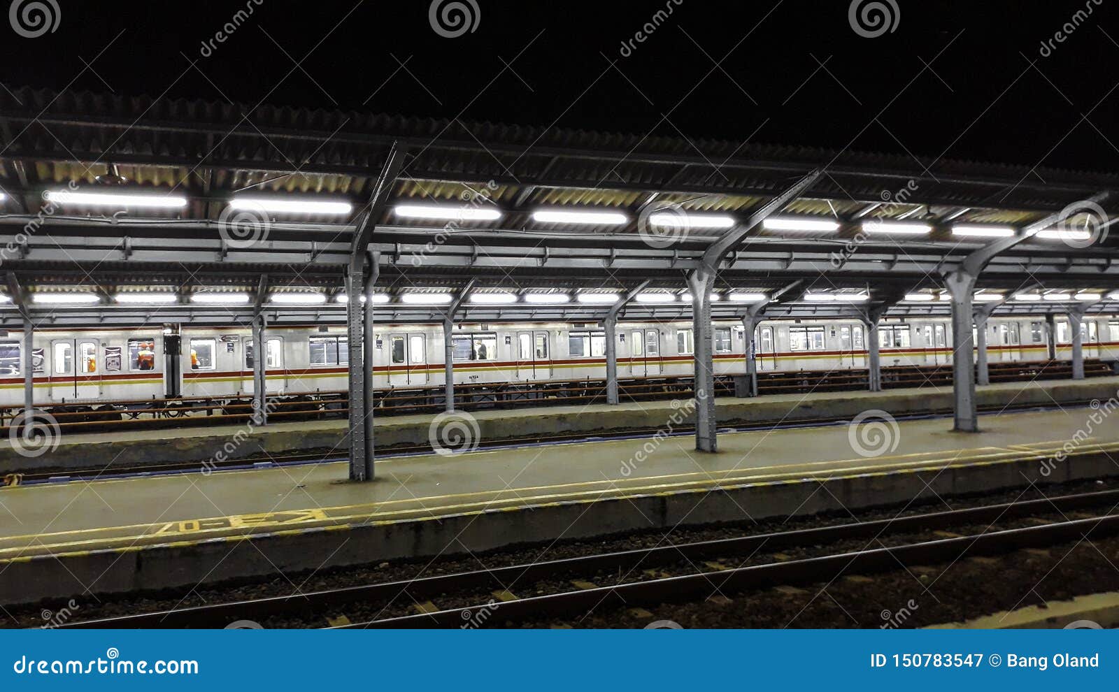 Passenger Platform at Night at the Jakarta City Train Station. Train ...