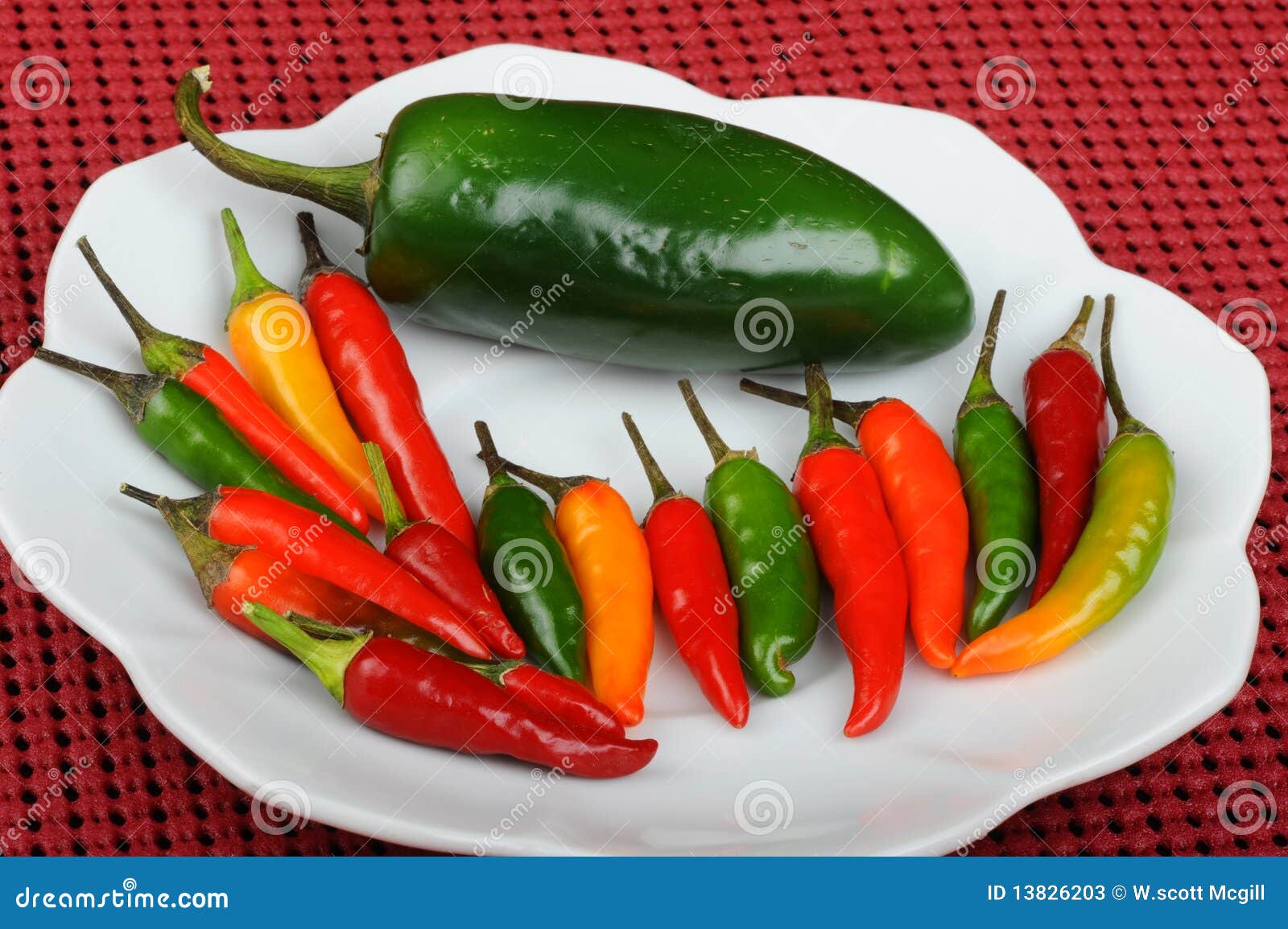 Jalapeno and Thai peppers stock image. Image of thai 13826203