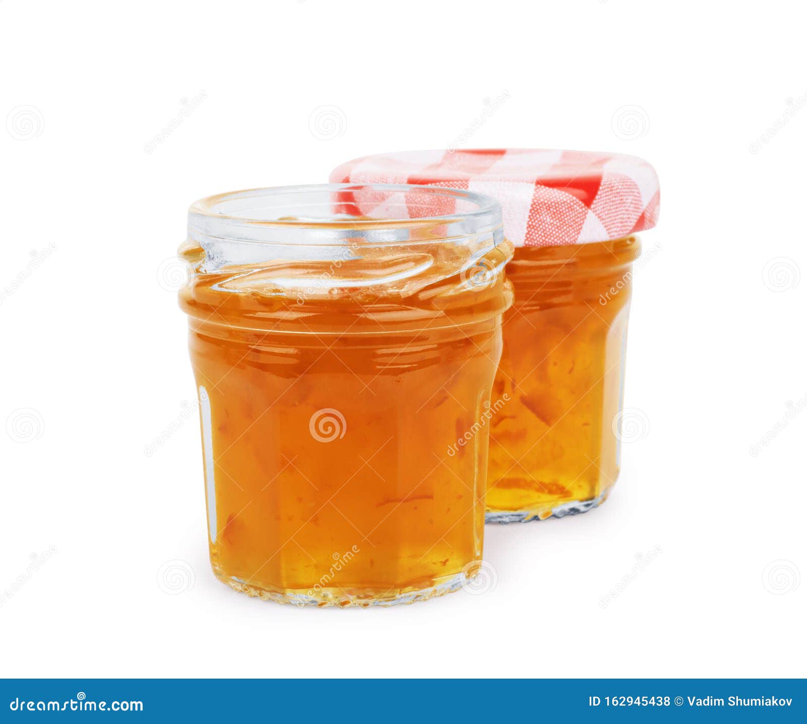 jam in a glass jar on a white background