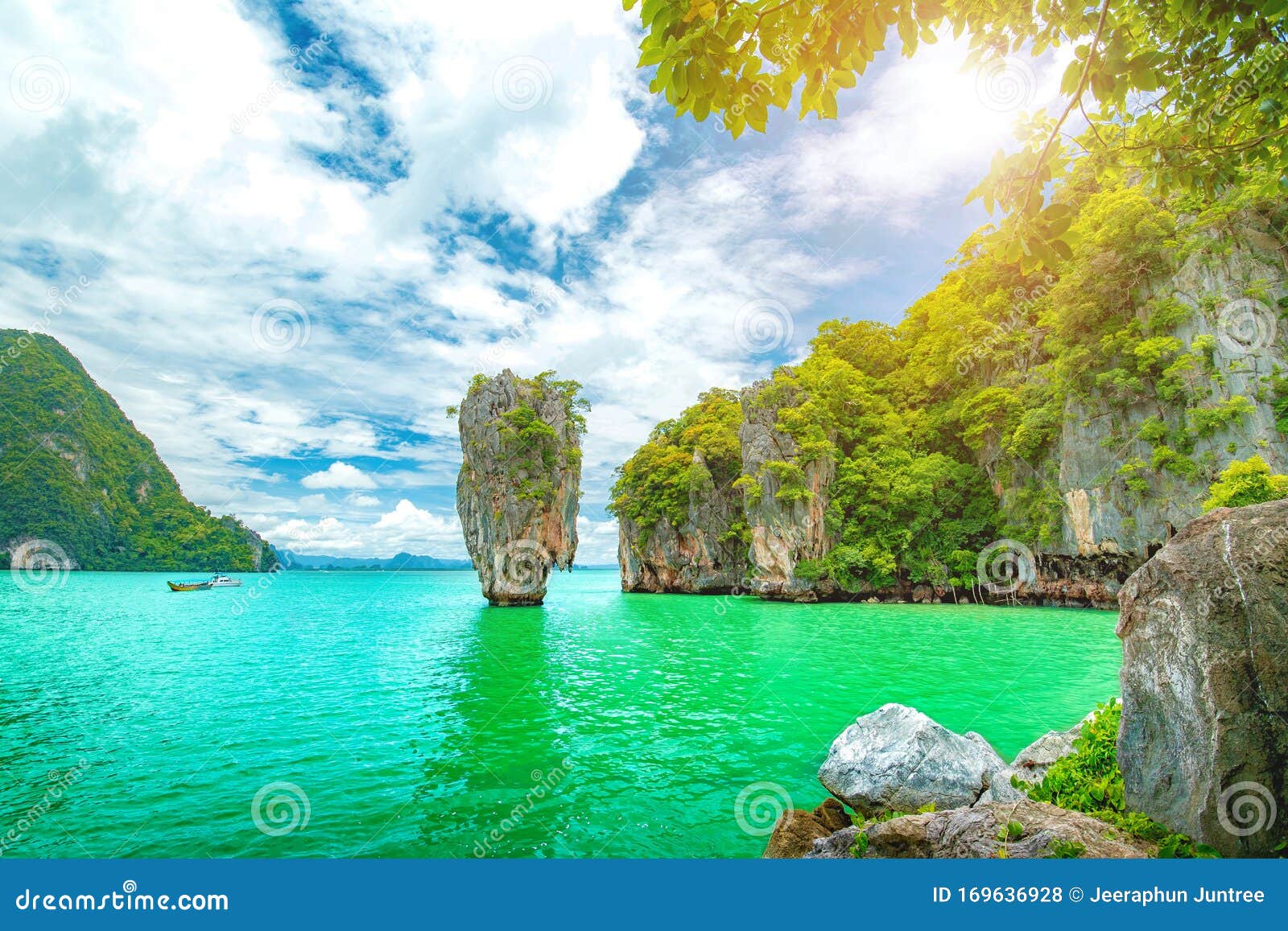 James Bond Island in Phang Nga Bay with Couldy Sky and Clear Water ,a