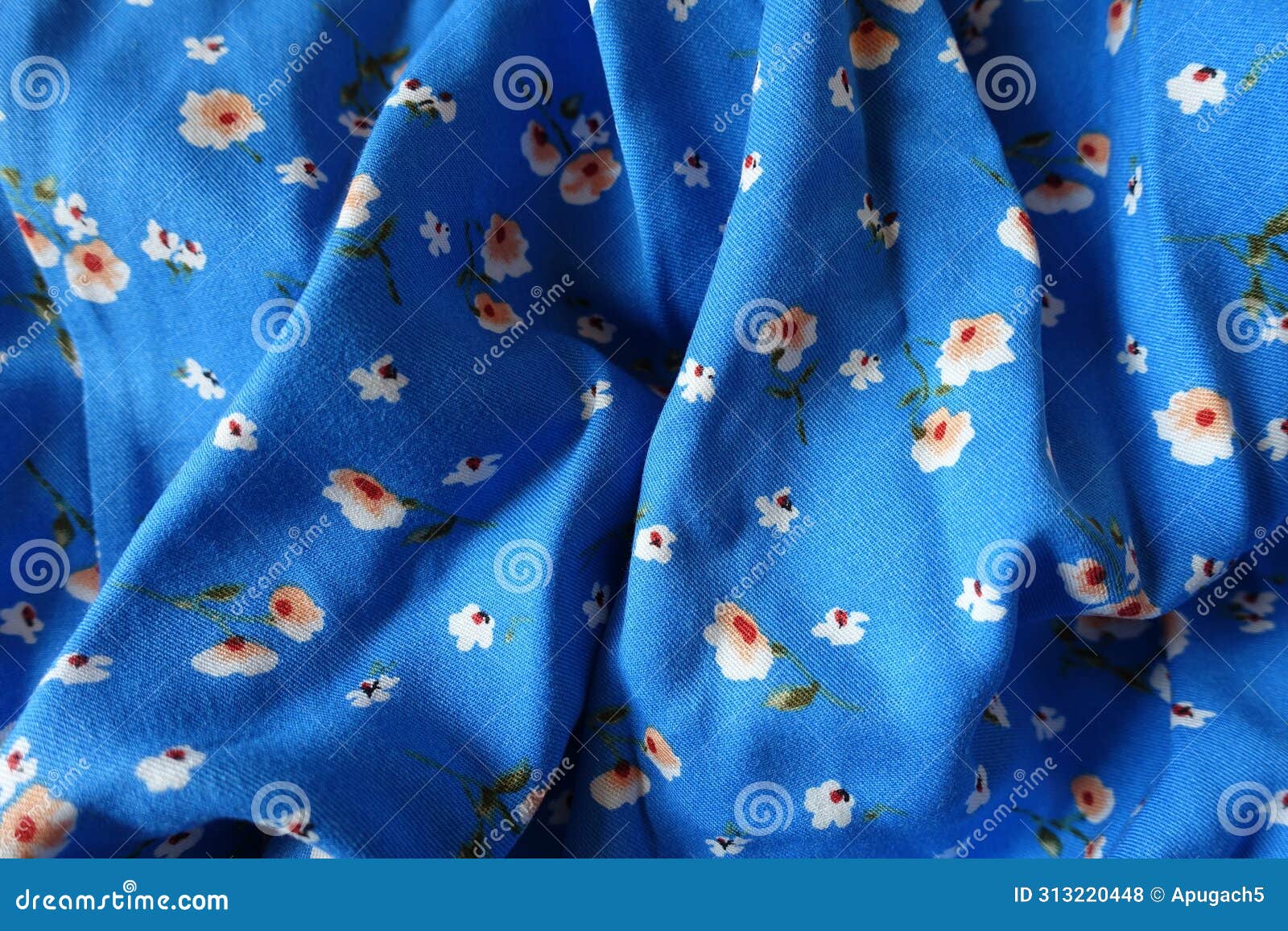 jammed vibrant blue cotton fabric with old-fashioned floral print
