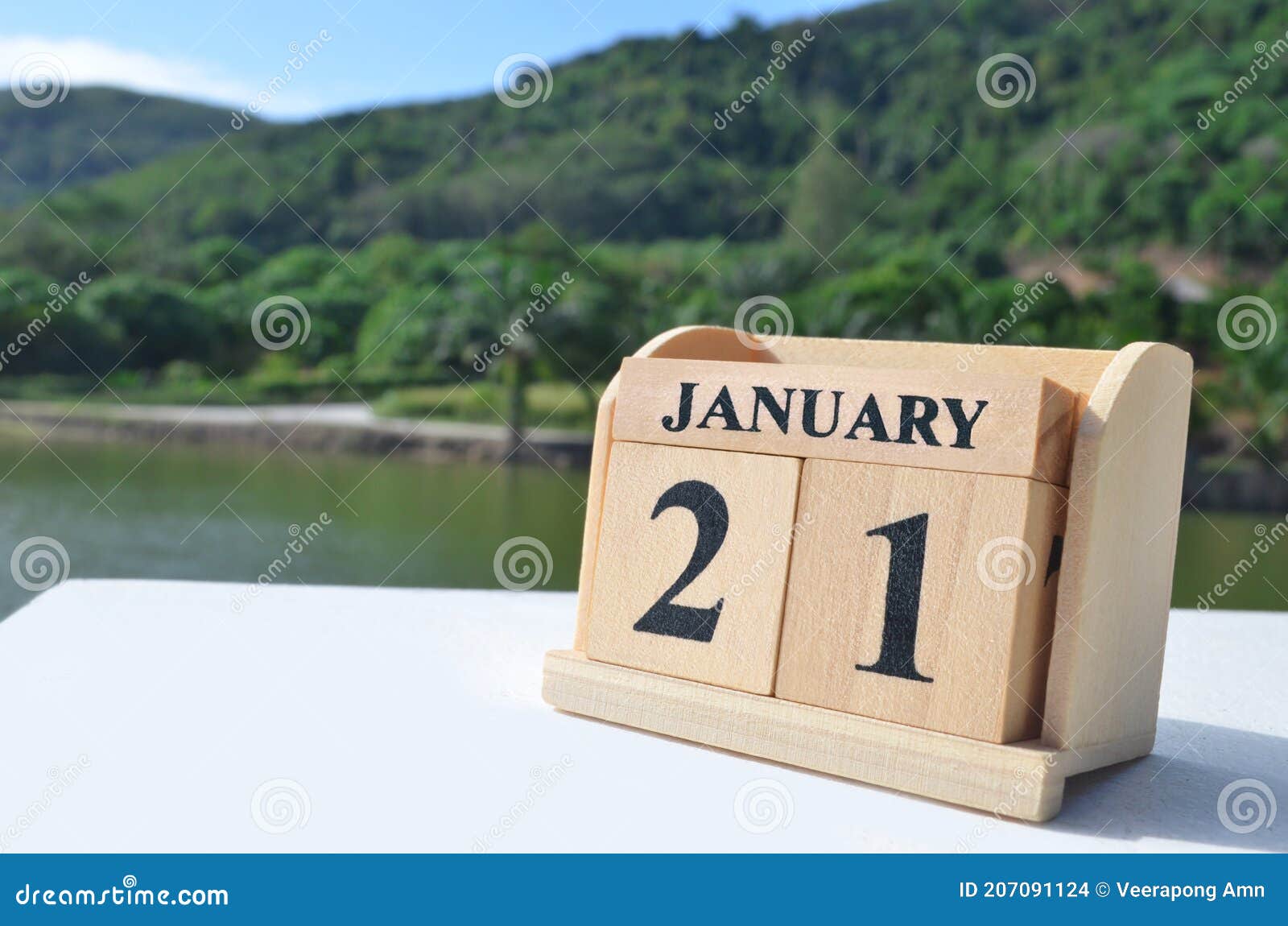 january 21, date  with number cube on white table, cover  in the natural concept.