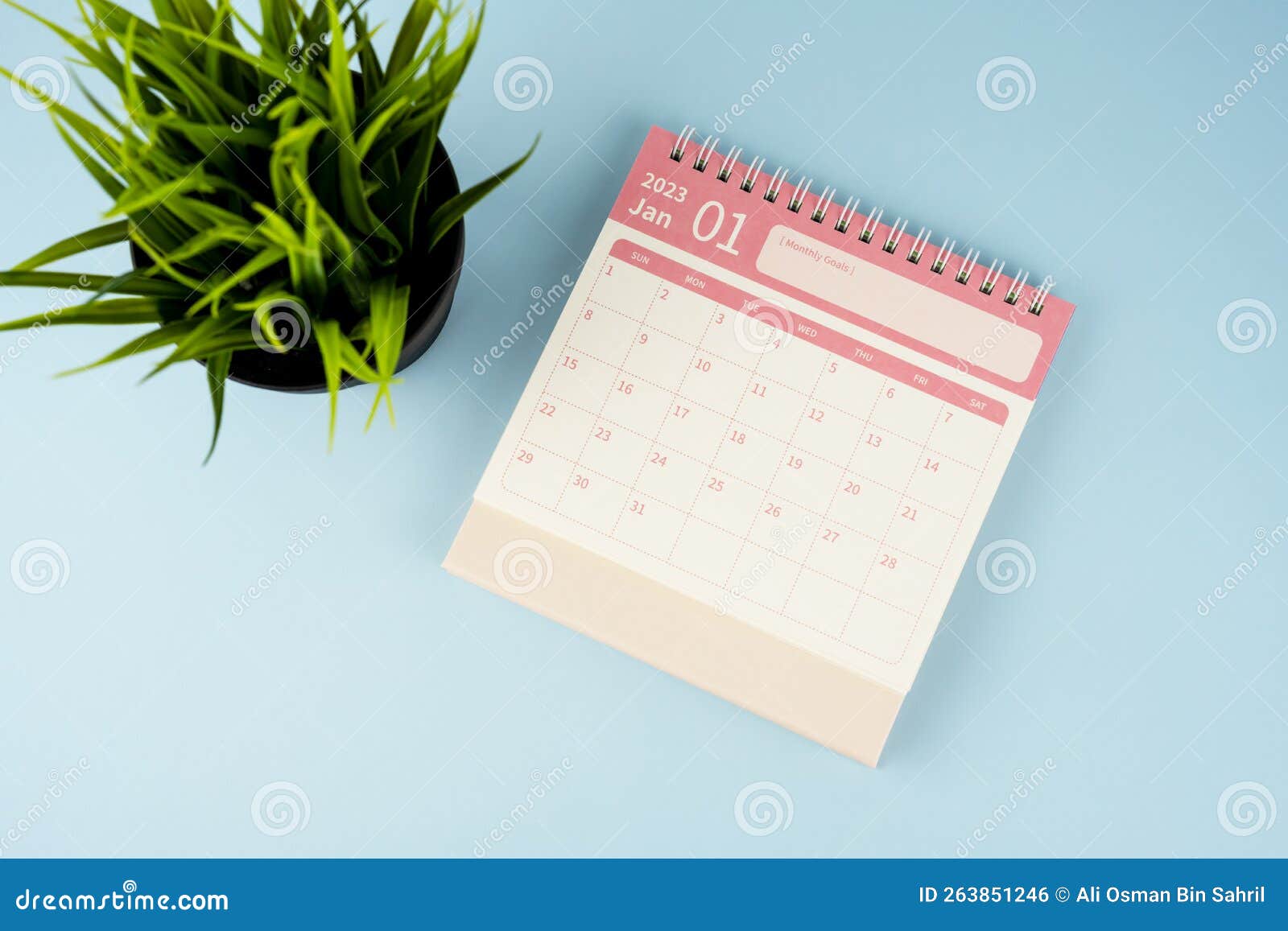 January 2023 Desk Calendar on Blue Background Flay Lay Stock Photo