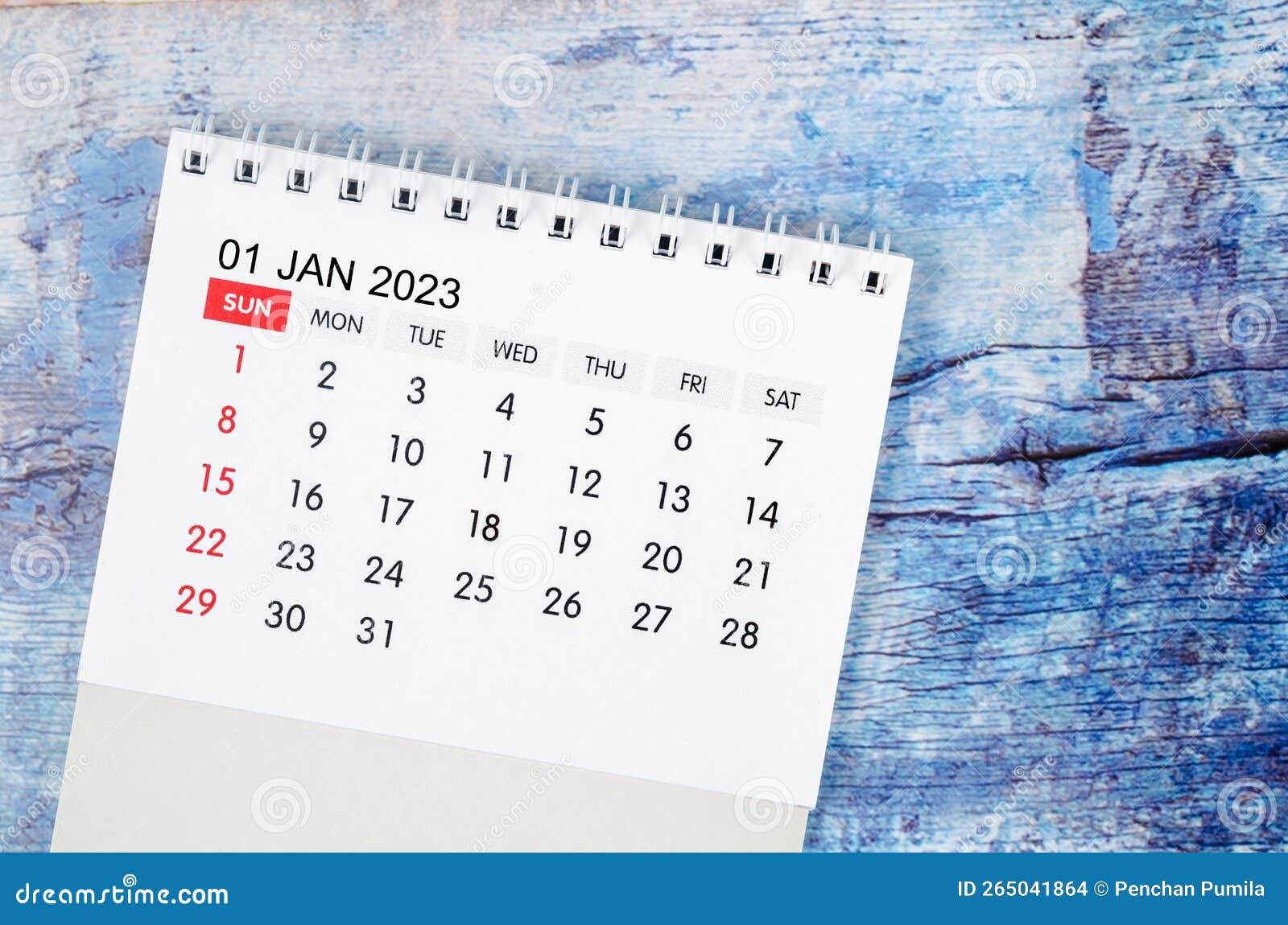 The January 2023 Monthly Desk Calendar for 2023 Year on Old Blue Wooden
