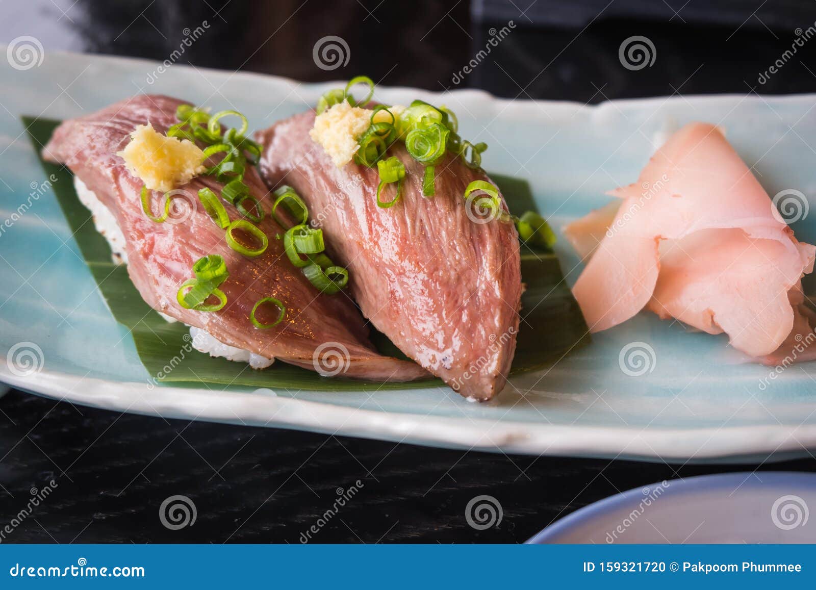 Japanese Beef Sushi on Rice with Chopped Spring Onion Stock Photo