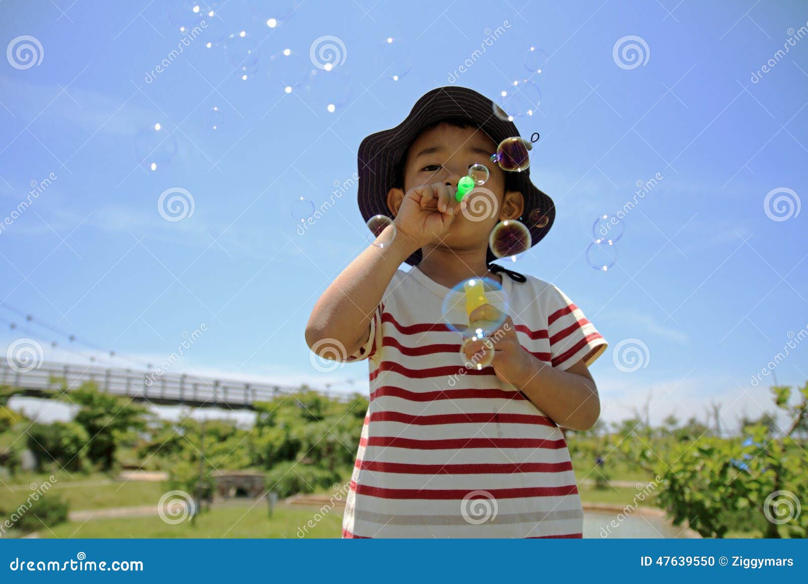 Japanese Boy Blowing Bubbles Stock Photo 47639550