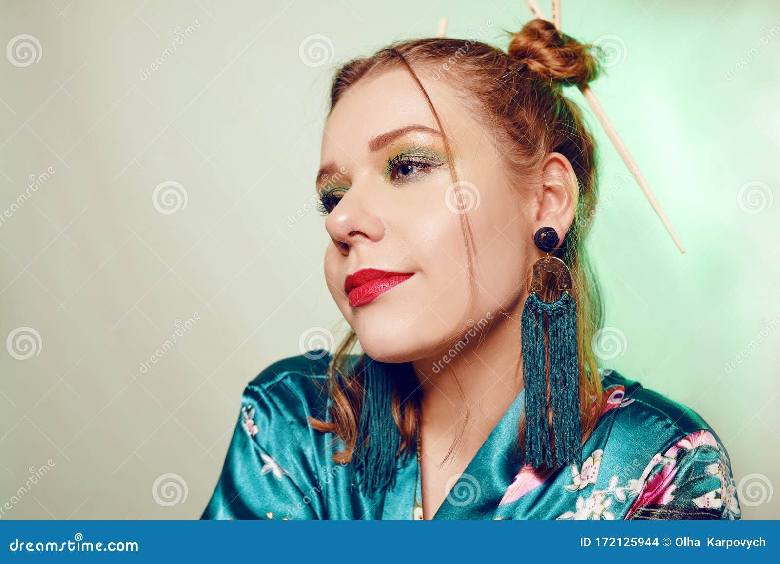 Japanese / Chinese / Asian Style Girl with Chopsticks in Her Hair. Girl with an Interesting Hairstyle, on a Green Background in a Stock Photo - Image of hand, japan: 172125944 Japanese / Chinese / Asian Style Girl with Chopsticks in Her Hair. Girl with an Interesting Hairstyle, on a Green Background in a Stock Photo - Image of hand, japan: 172125944