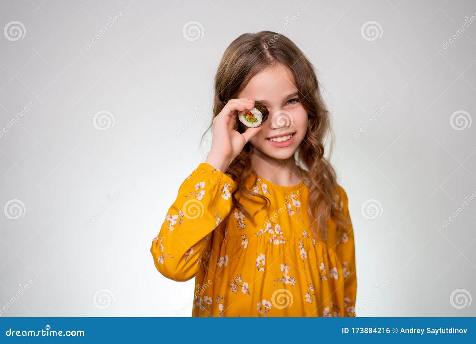 The Teen Girl Puts One Roll To the Eye and Smiles. Stock Photo - Image of  asian, ethnicities: 173884216