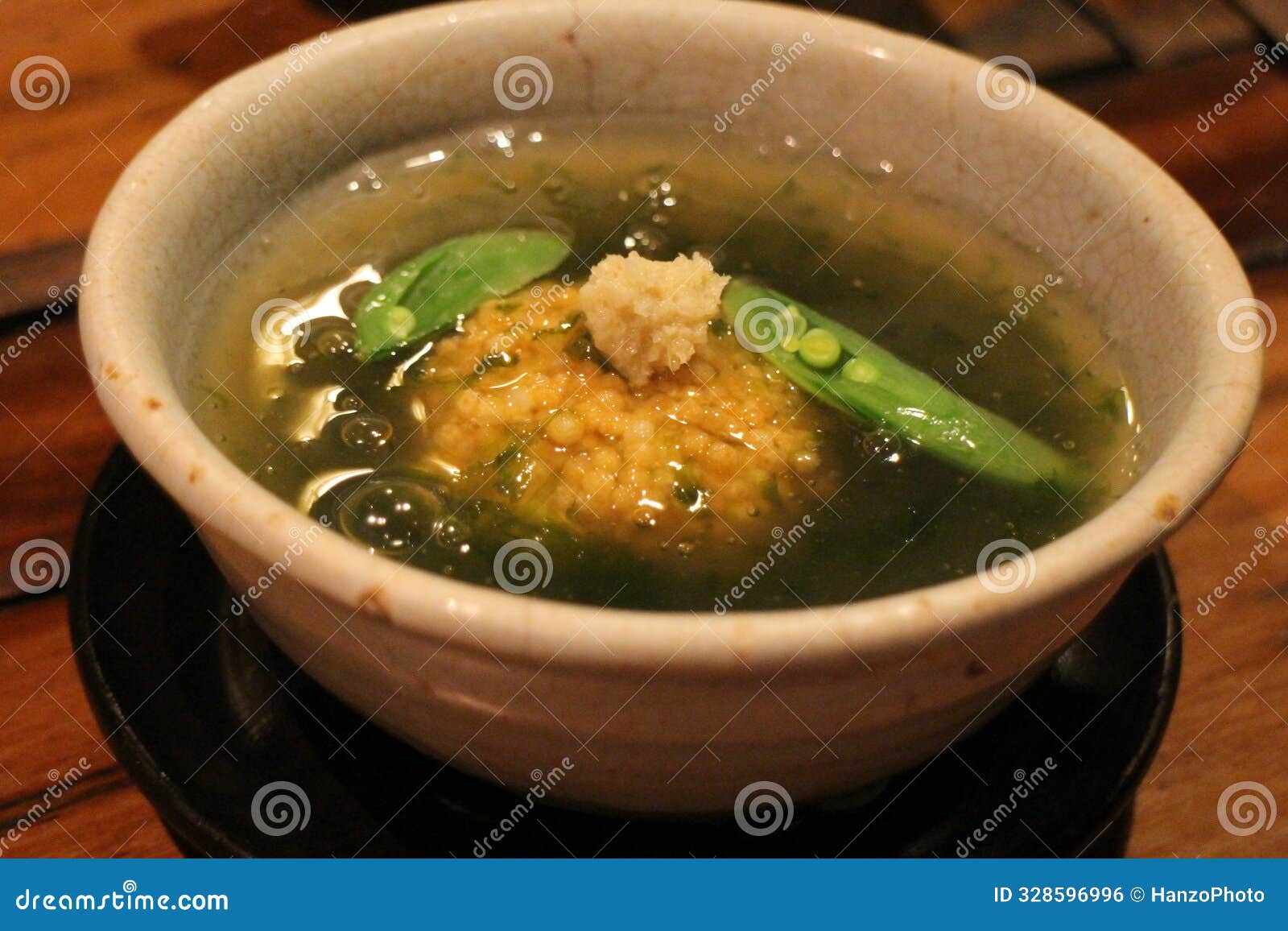 japanese cuisine : pea dumpling with seaweed sauce in kyoto, japan