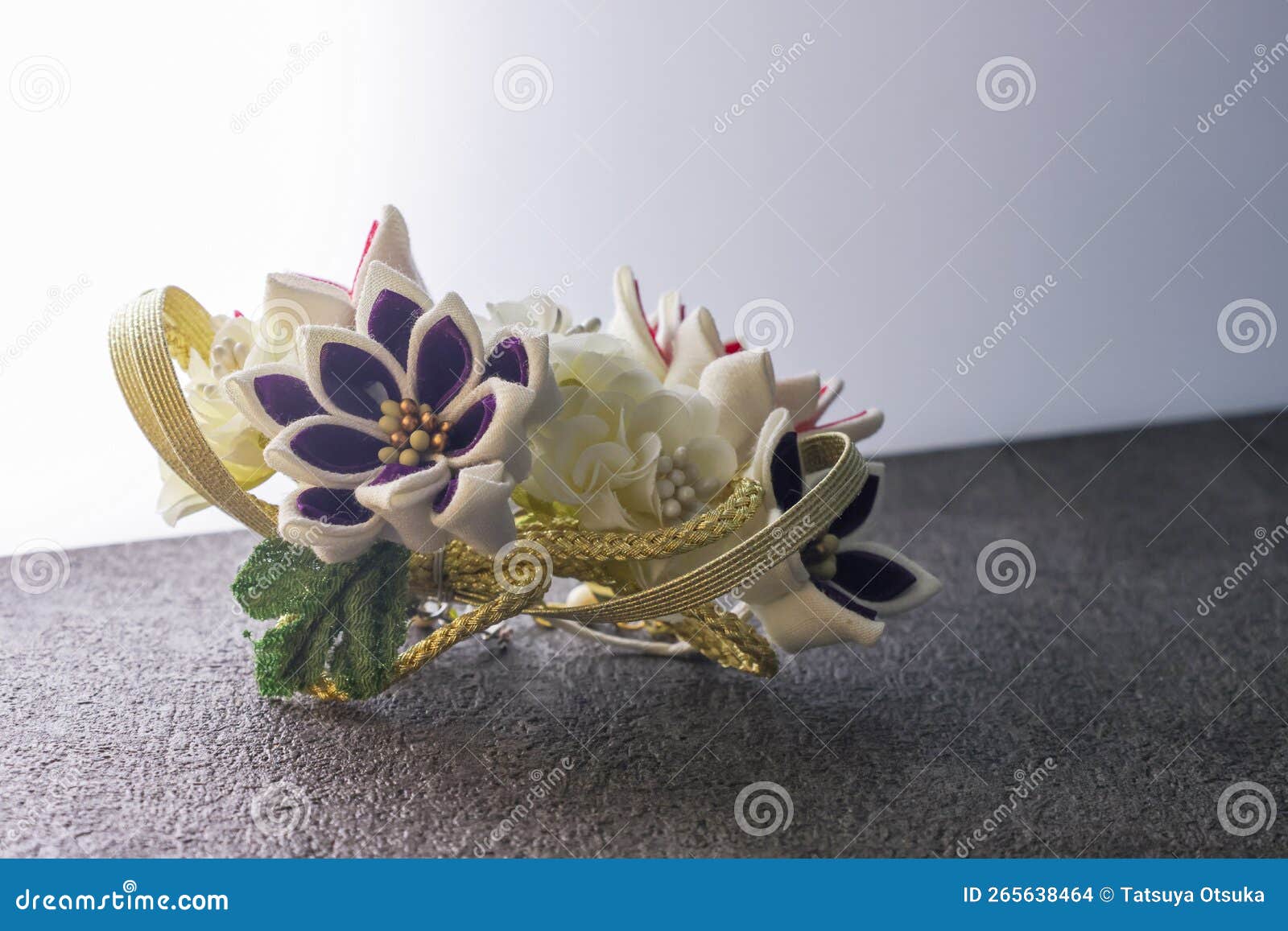 Japanese Decorative Hair Pin on a Stone Pattern Board. Stock Photo