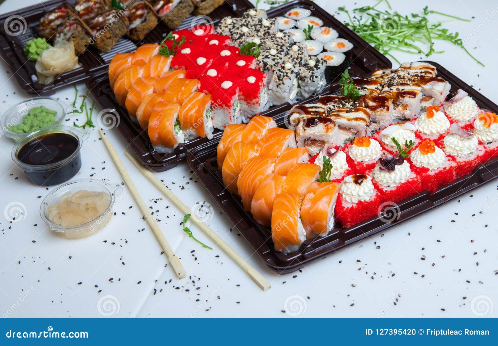 Download Japanese Food Rolls In Plastic Box. Sushi Set In A Plastic ...