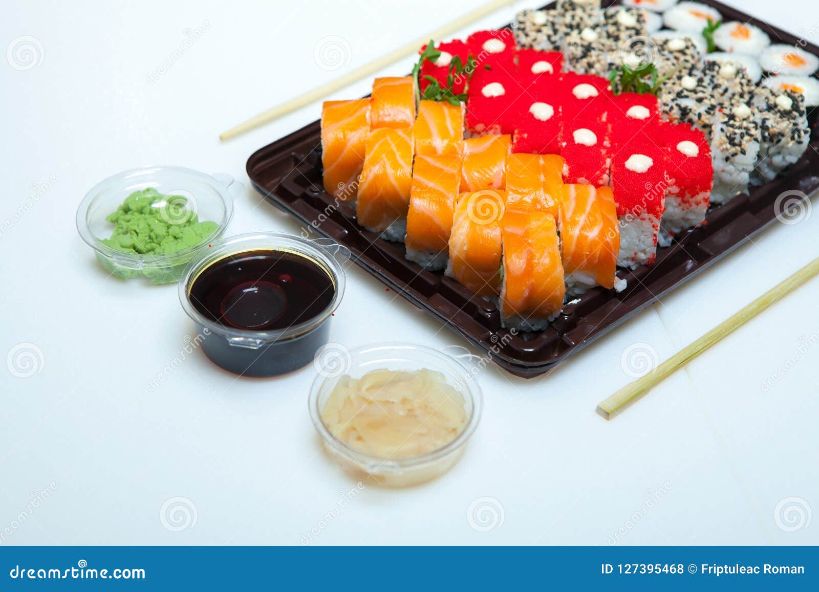 Download Japanese Food Rolls In Plastic Box. Sushi Set In A Plastic ...