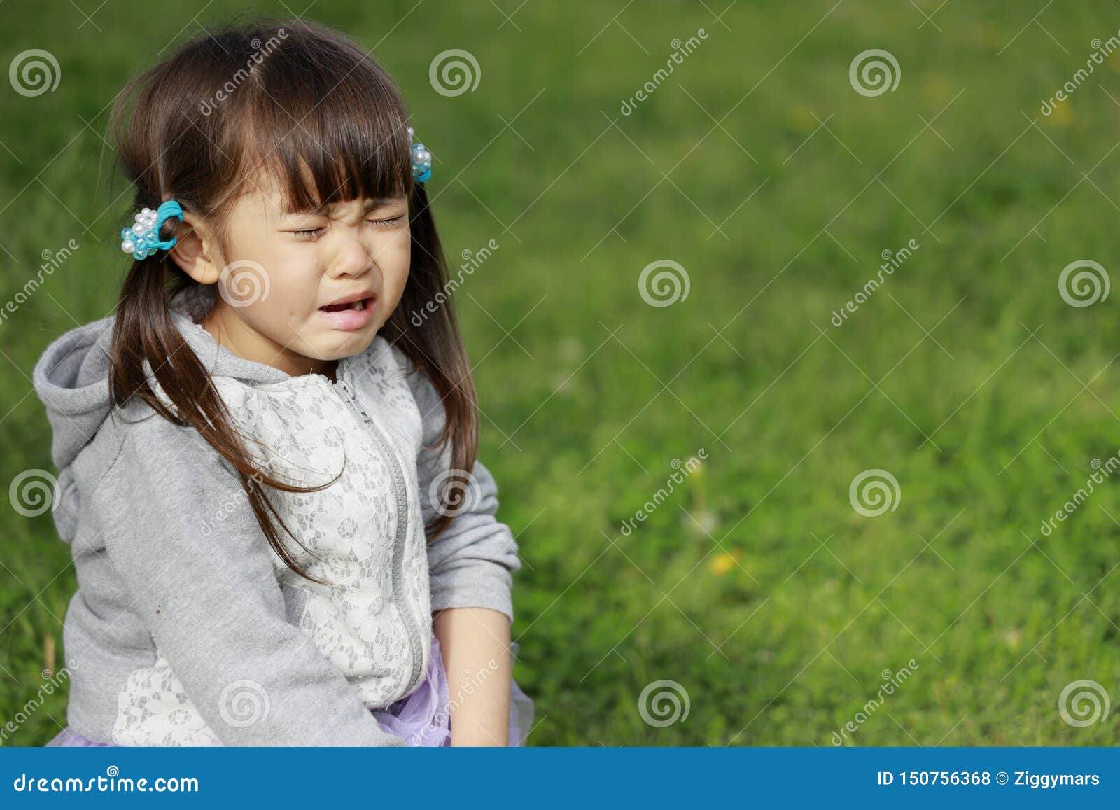 Japanese Girl Crying On The Grass Stock Photo Image Of Japanese