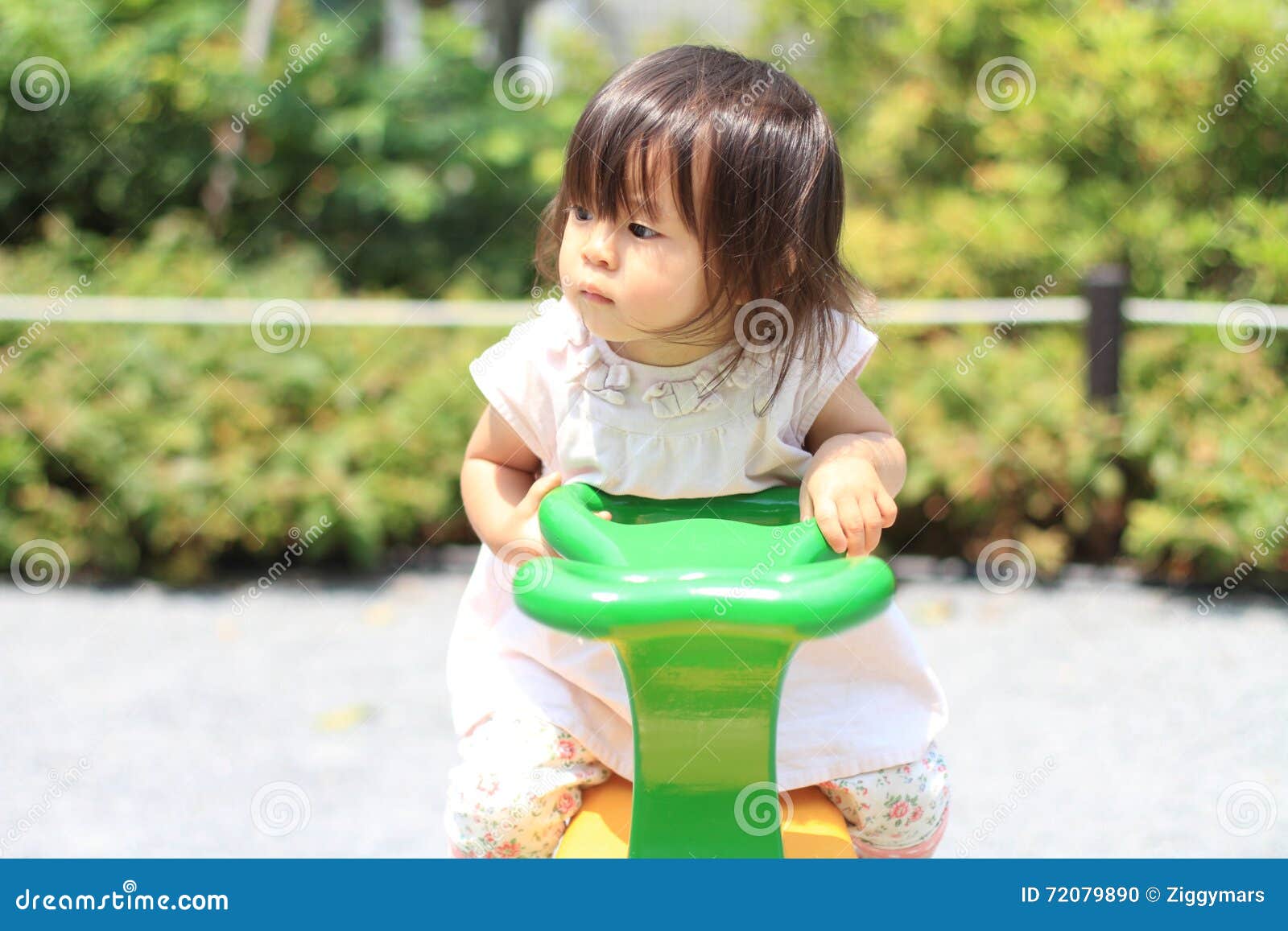 Japanese Girl on the Seesaw Stock Photo - Image of teeter, year: 72079890