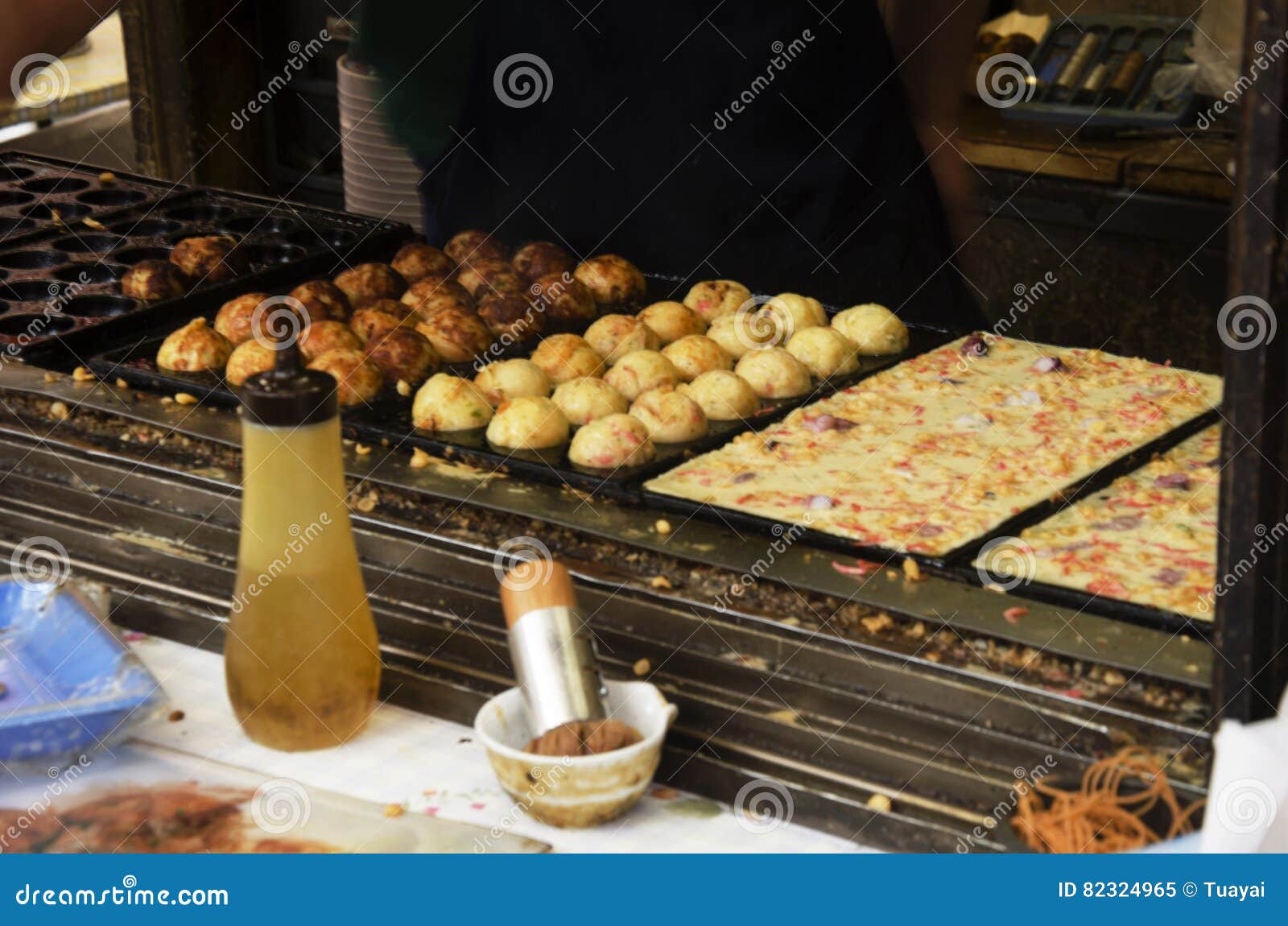 japanese people cooking takoyaki is a ball-d japanese snack