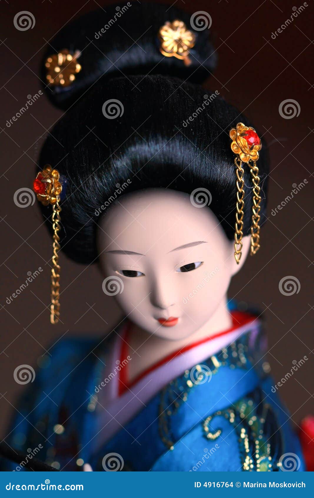 Japanese Porcelain Doll In Blue Kimono Stock Images 
