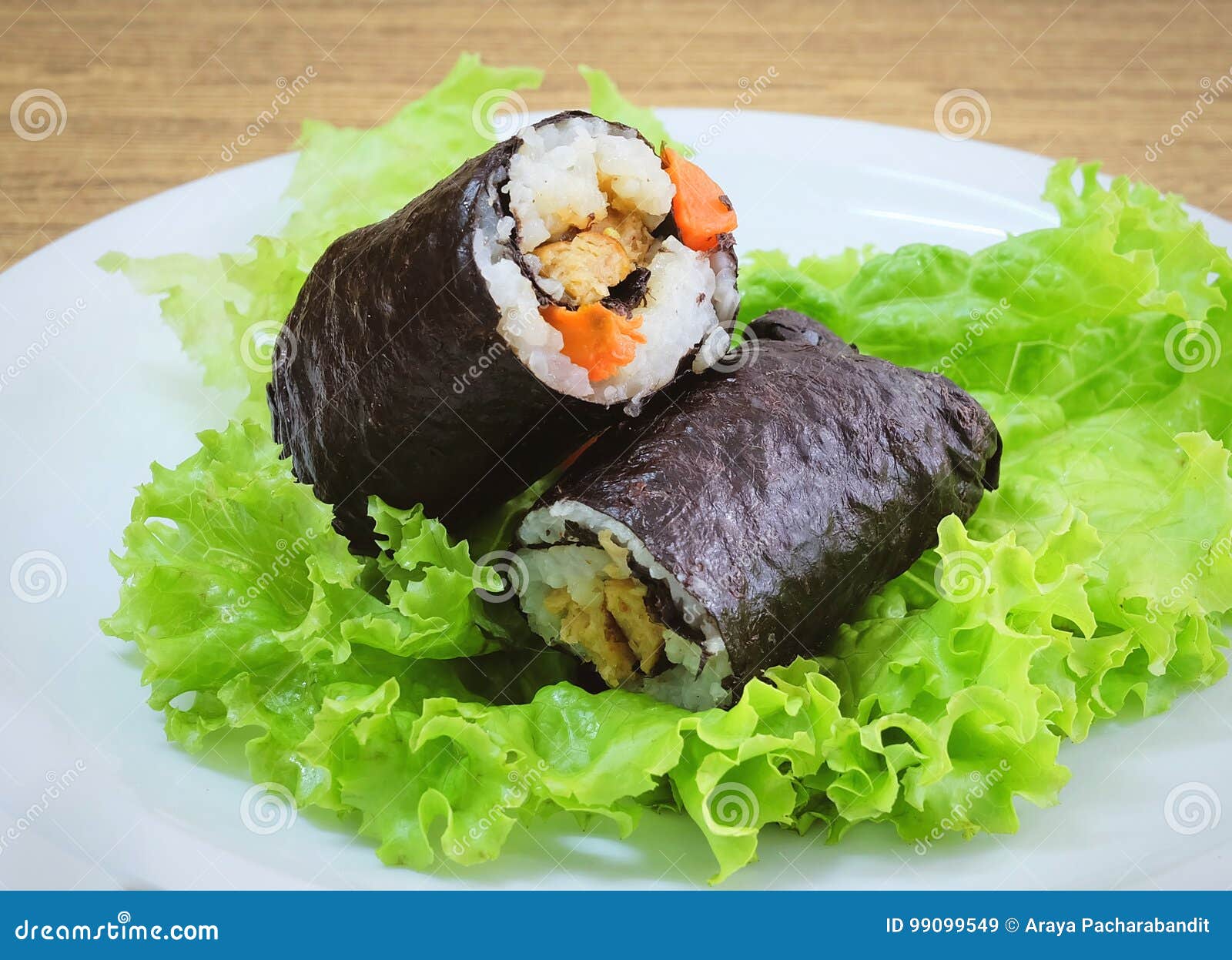 https://thumbs.dreamstime.com/z/japanese-rice-maki-sushi-roll-stuff-tofu-carrot-cuisine-traditional-vagetarian-wrapped-nori-seaweed-served-green-99099549.jpg