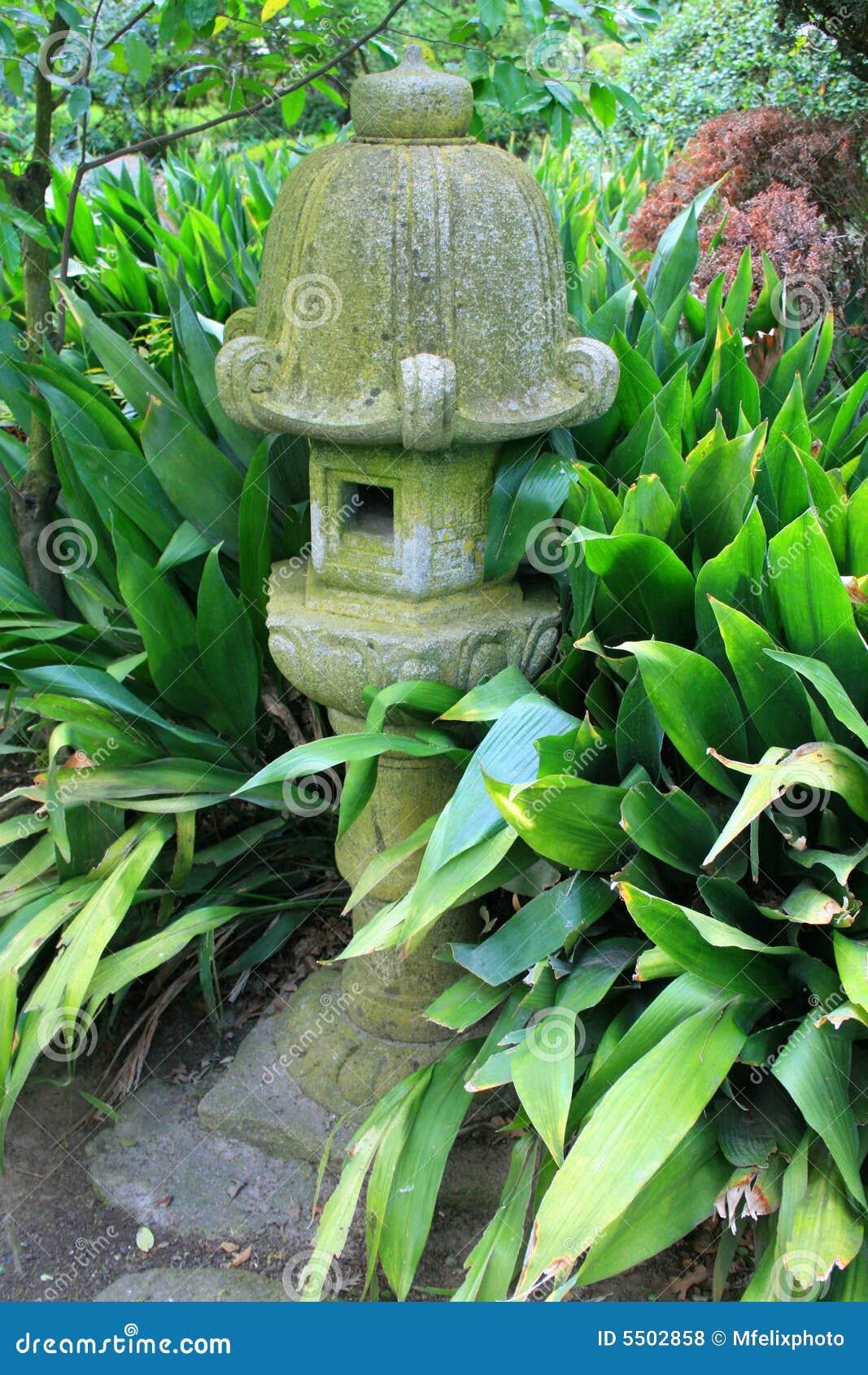 Japanese Statue in a Garden Stock Photo Image of asia, japanese 5502858