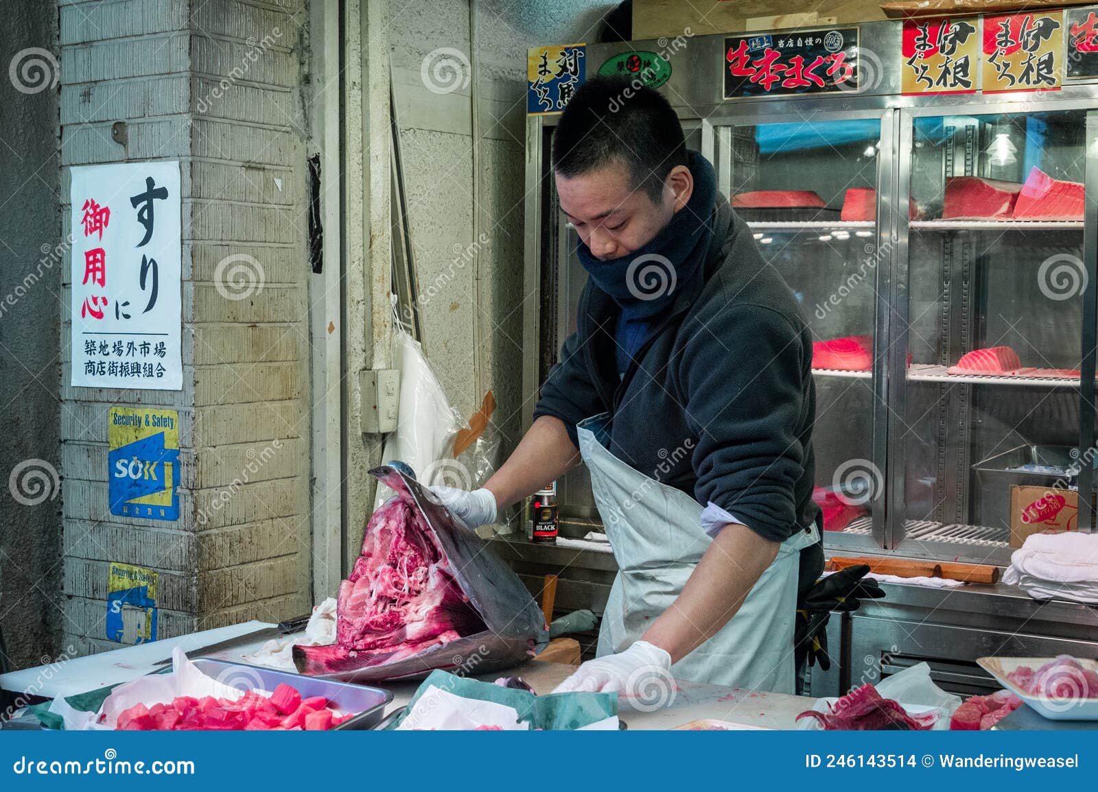 Japanese Street Food Vendor Preparing Tuna at Tsukiji Market in Tokyo