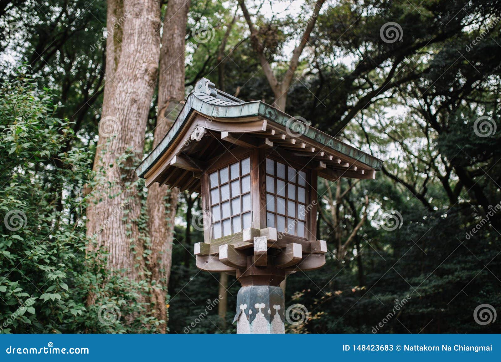 Japanese Style Wooden Lantern with Trees on Background. Stock Image ...