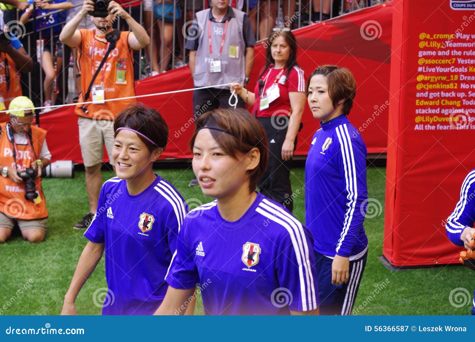 Japanese Fan Of Football With Japan Symbol Before Football Match