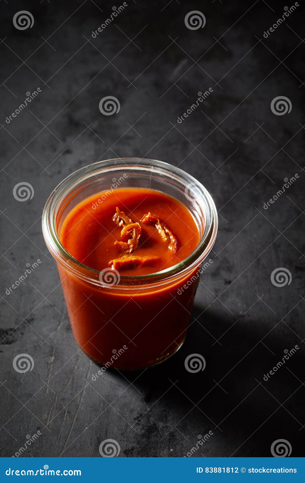 Jar Filled with Hot Sauce on Black Surface Stock Photo Image of