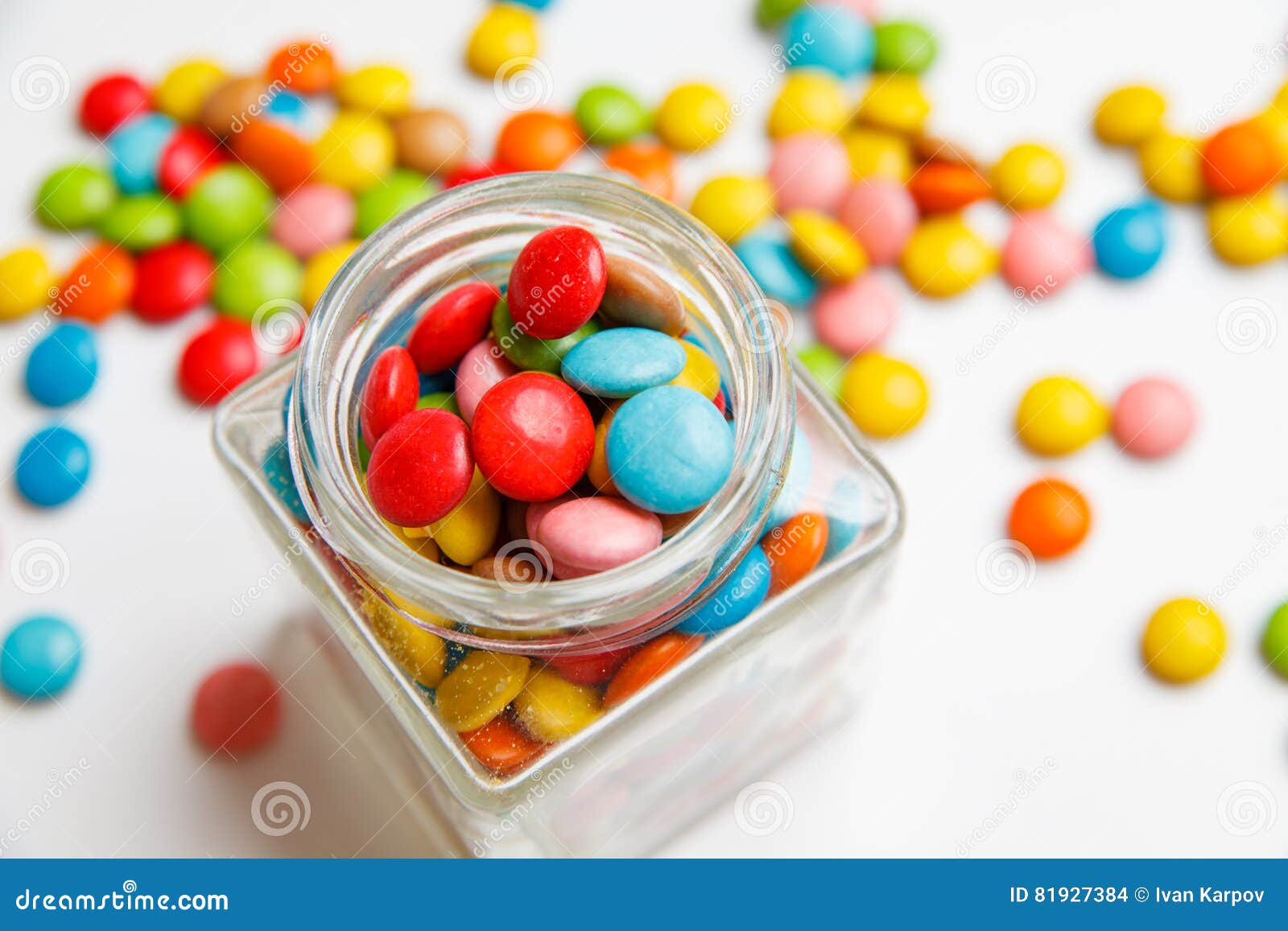 Jar Full of Colorful Candies and Scattered Sweets. View from Above ...