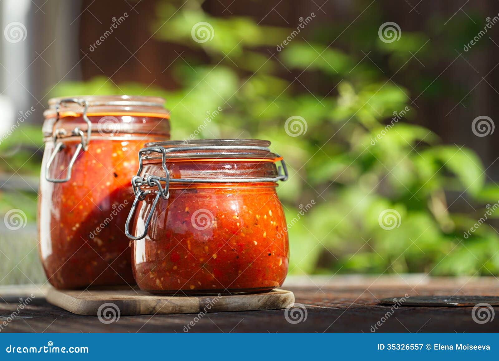 jar of home made classic spicy tomato salsa