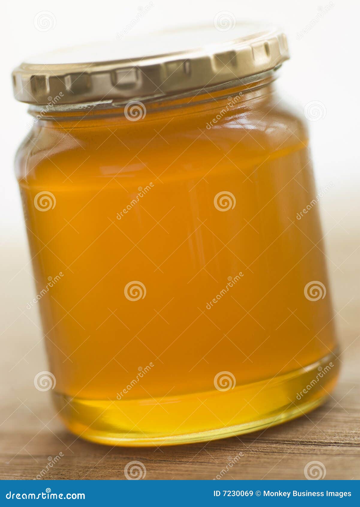 Jar of Honey and Spoon stock image. Image of food, single 7230069