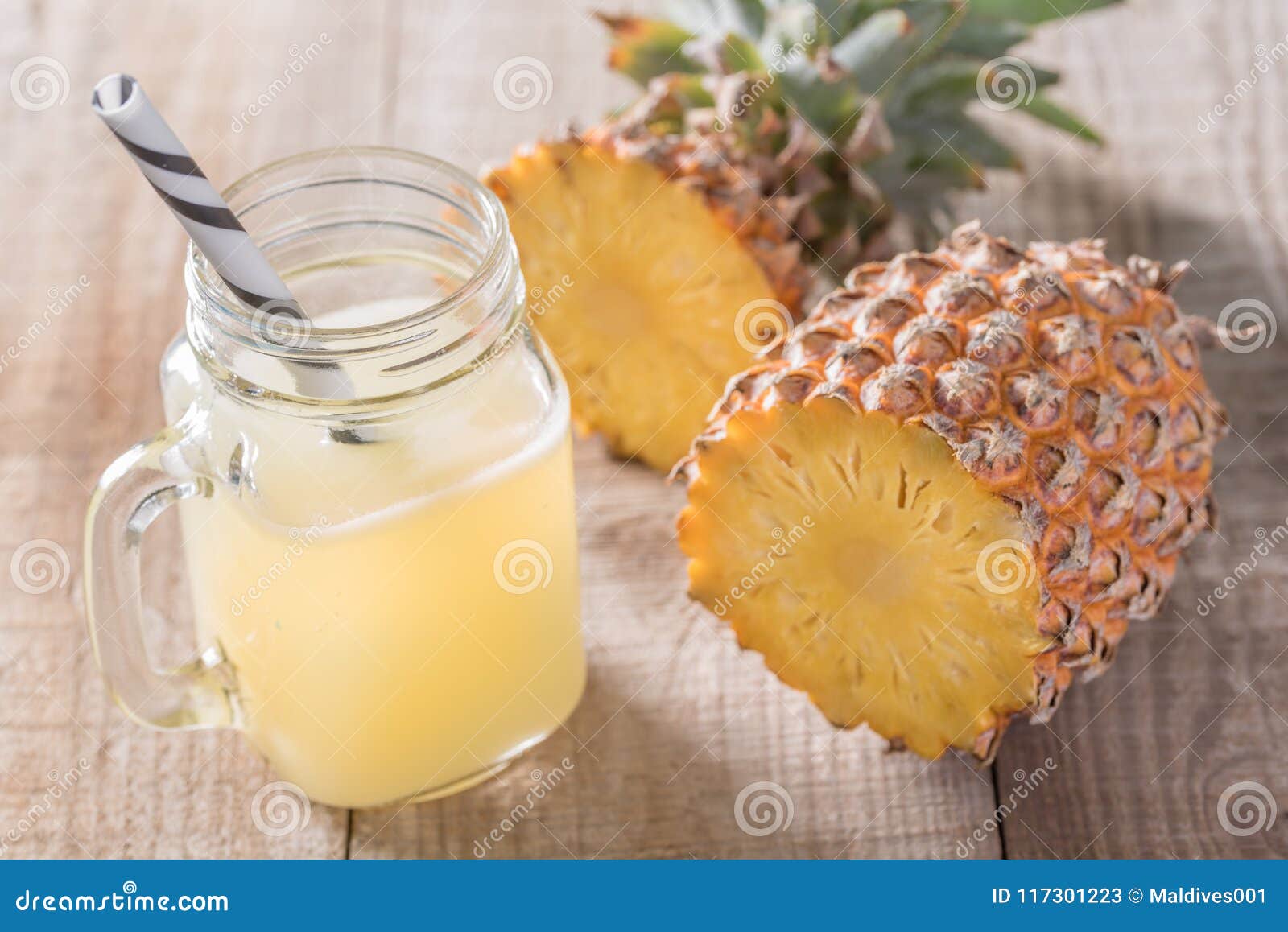 A Jar of Pineapple Juice with a Raw Pine Apple Stock Image Image of