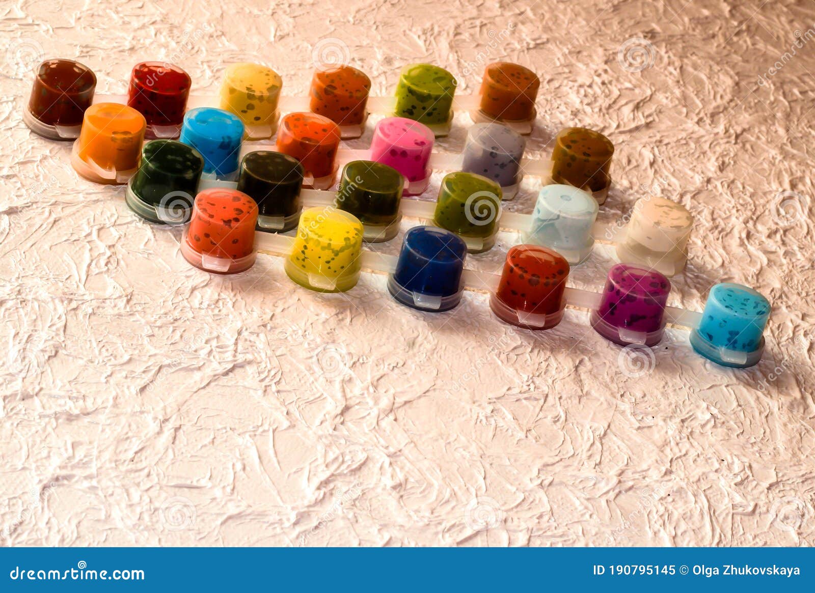 Jars With Acrylic Paint On A Light Crumpled Background RoyaltyFree