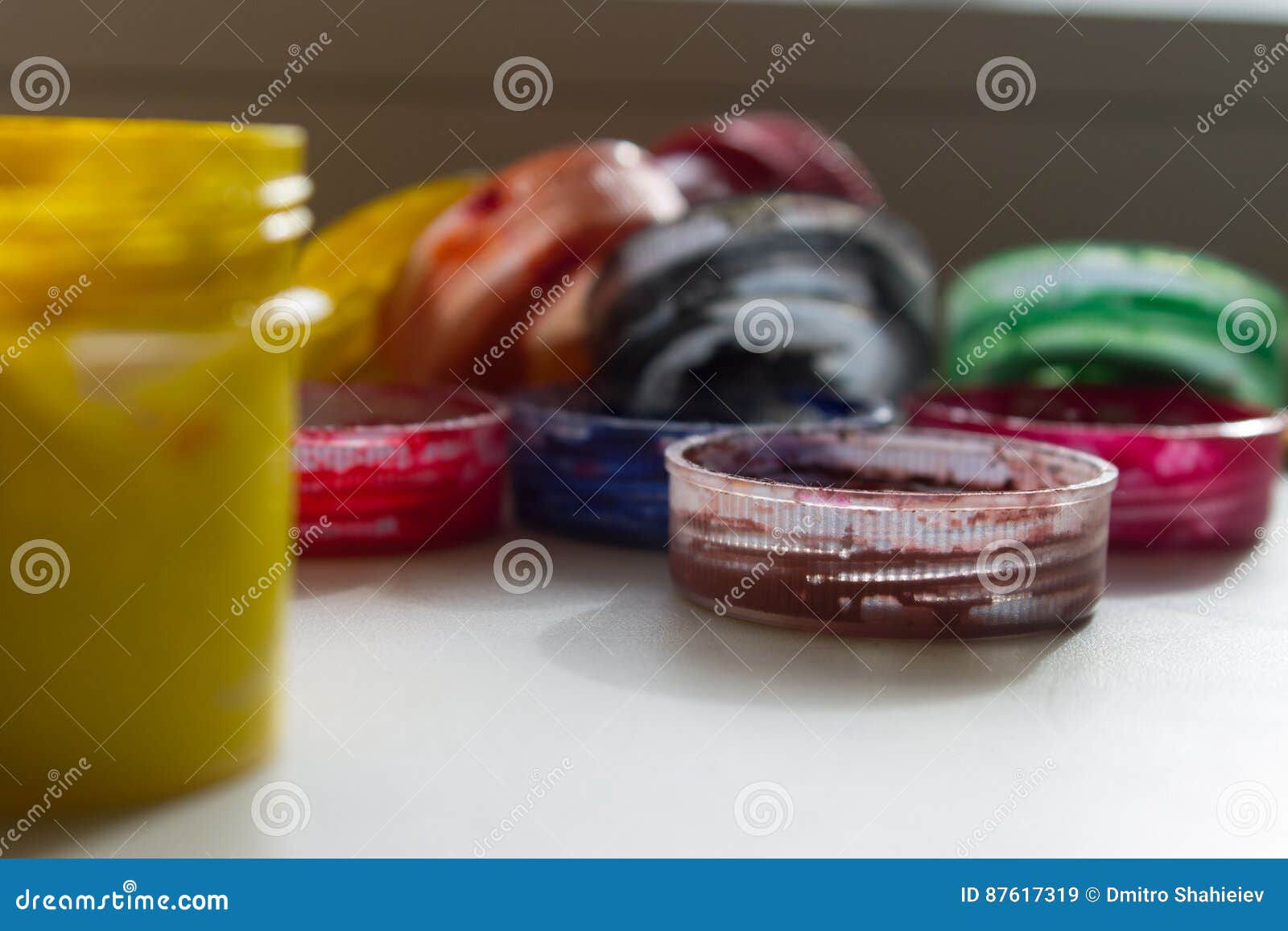 Jars With Acrylic Paint On A Light Crumpled Background RoyaltyFree