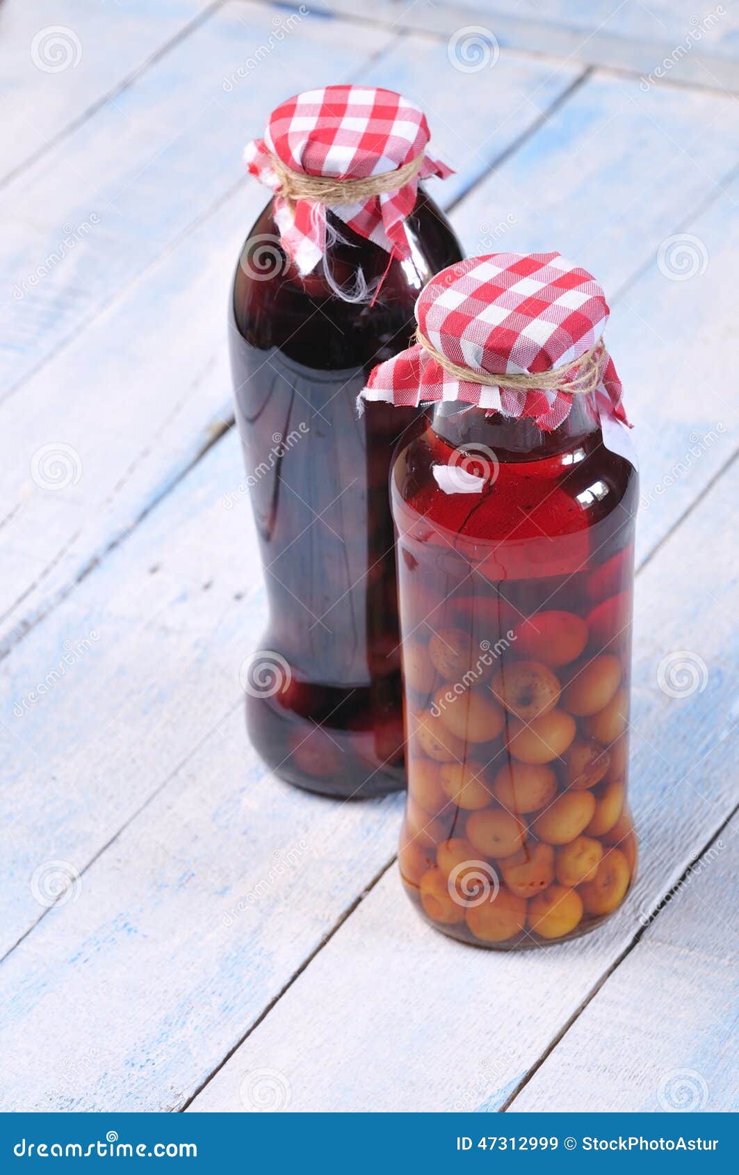 Jars with cherry liqueur stock image. Image of vintage 47312999