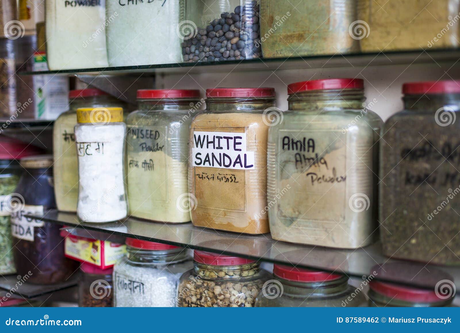 Jars of Herbs and Powders in a Indian Spice Shop. Stock Photo Image