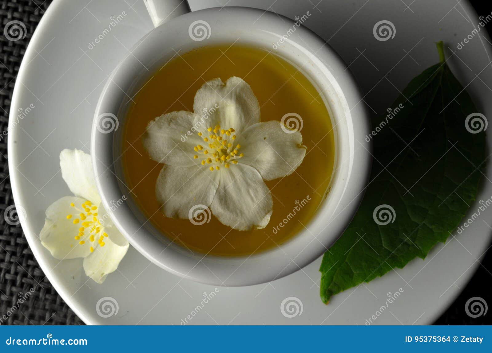 Jasmine tea with flowers stock photo. Image of beverage 95375364