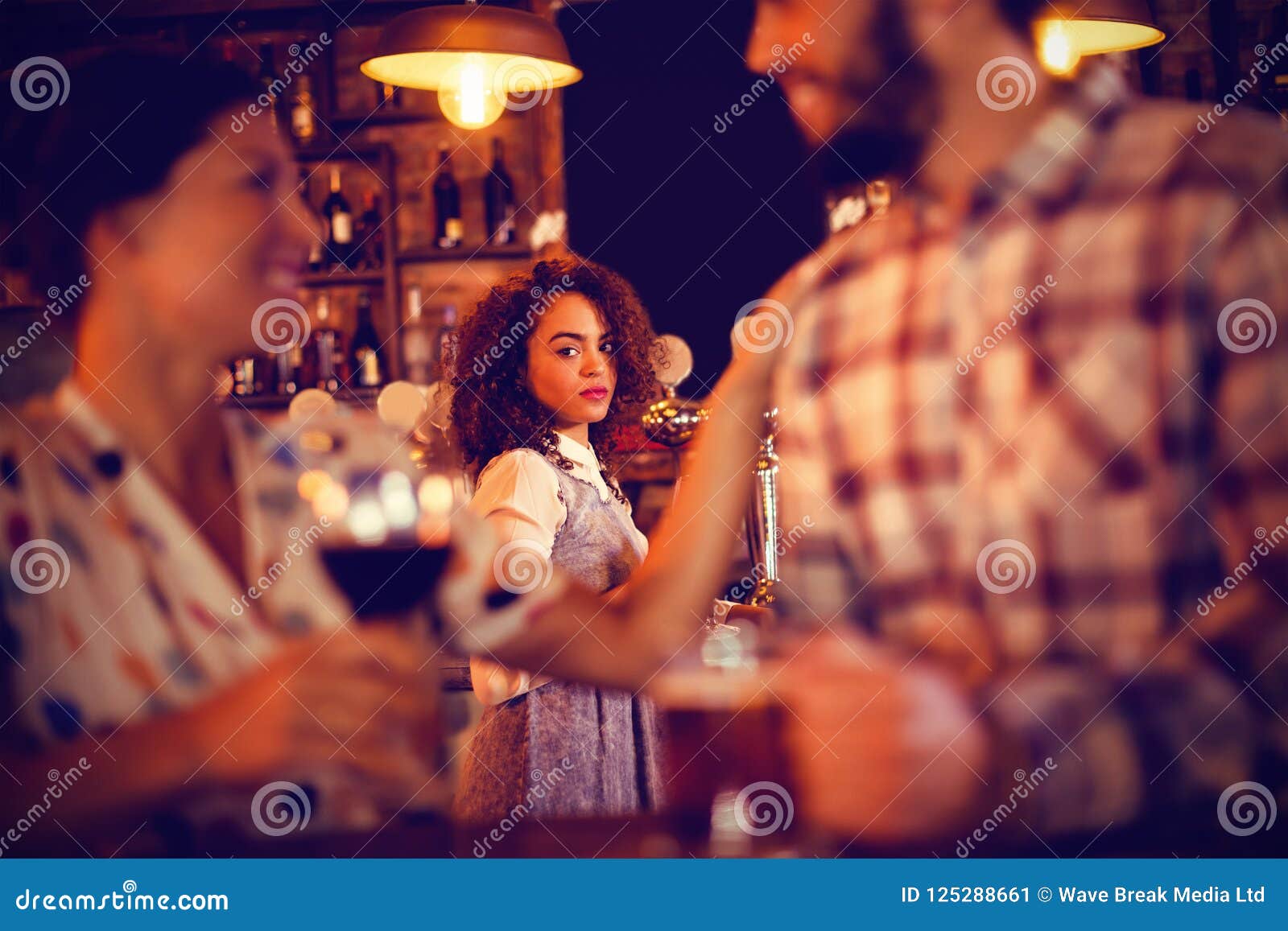 jealous woman looking at couple flirting with each other