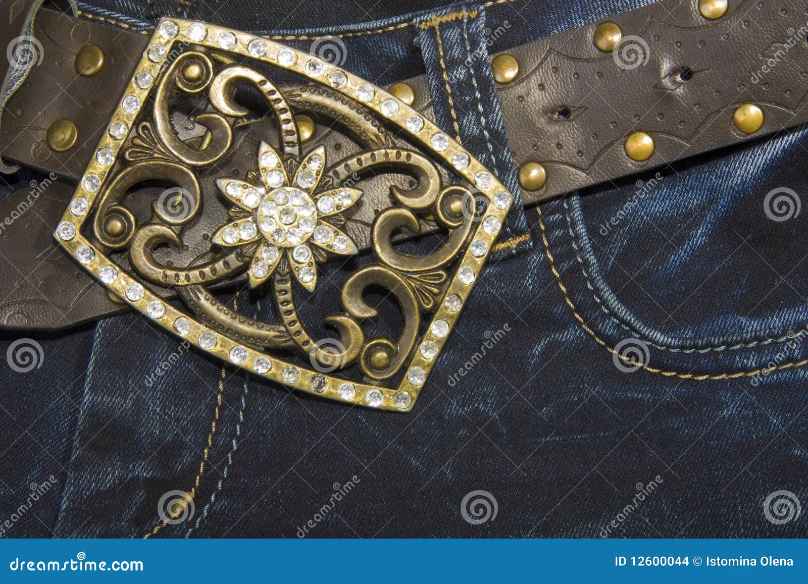 jeans with a belt decorated with rhinestones