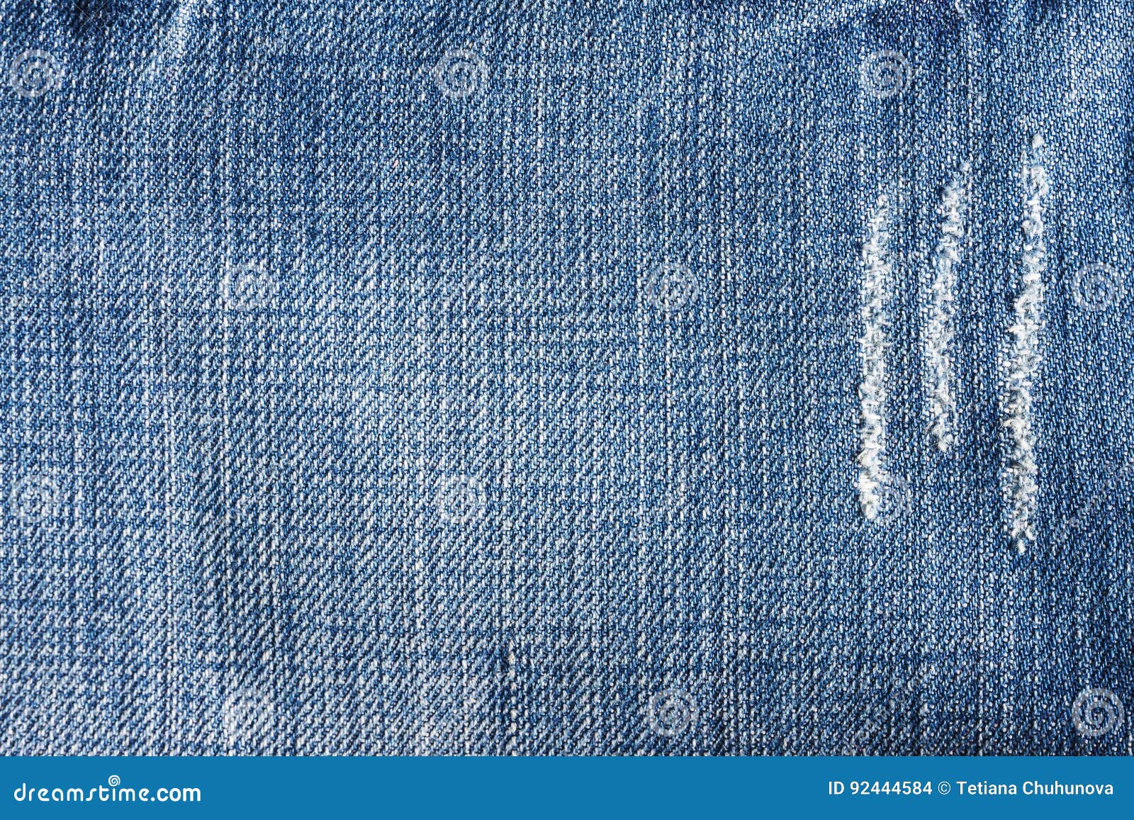 jeans close-up, texture, torn, mopped pieces.