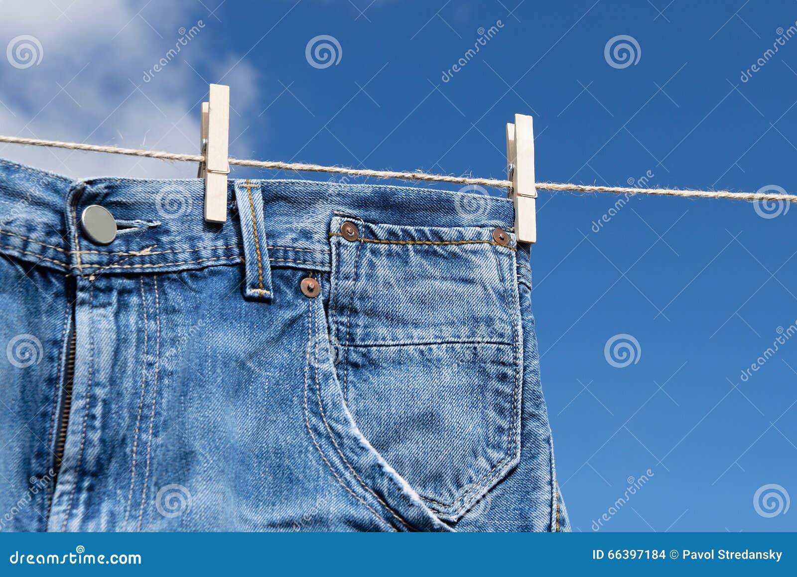 Jeans on a clothesline stock photo. Image of washing - 66397184