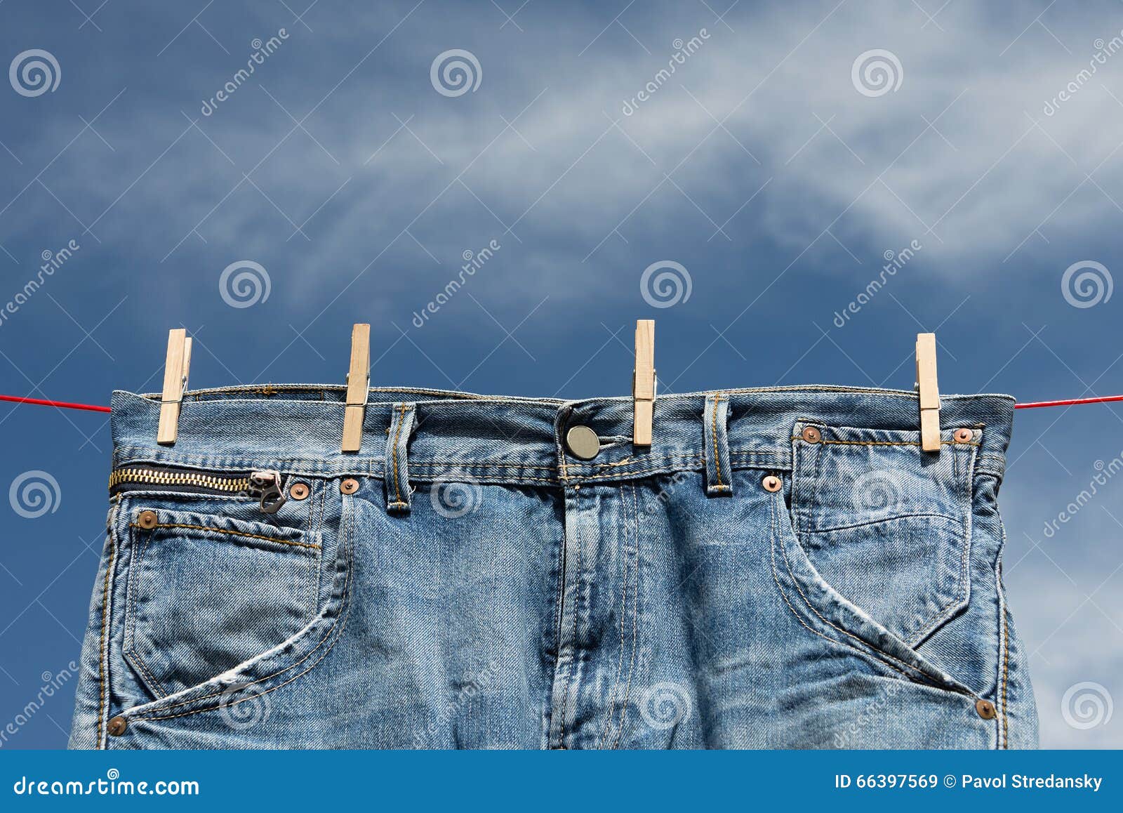 Jeans on a clothesline stock image. Image of summer, denim - 66397569