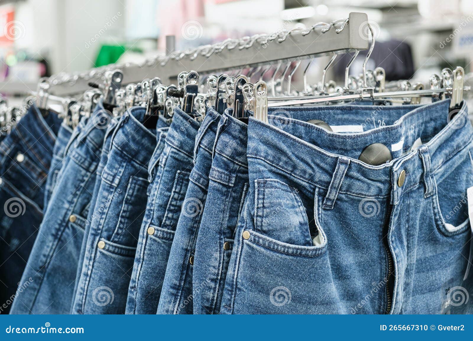 Jeans on Hangers on the Rack of a Retail Clothing Store Stock Photo ...