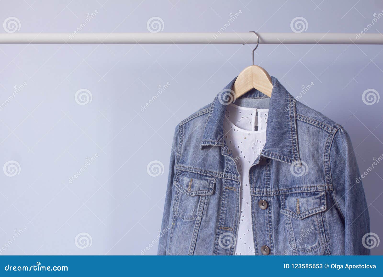 Jeans Jacket on a Hanger on a Blue Background Stock Image - Image of ...