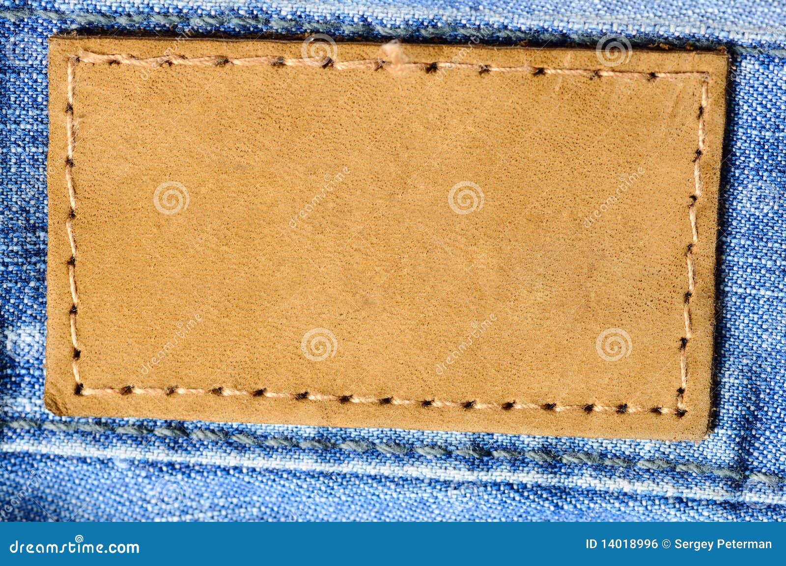 Jeans Waistband, Back Pockets and Leather Label in a Round Cut