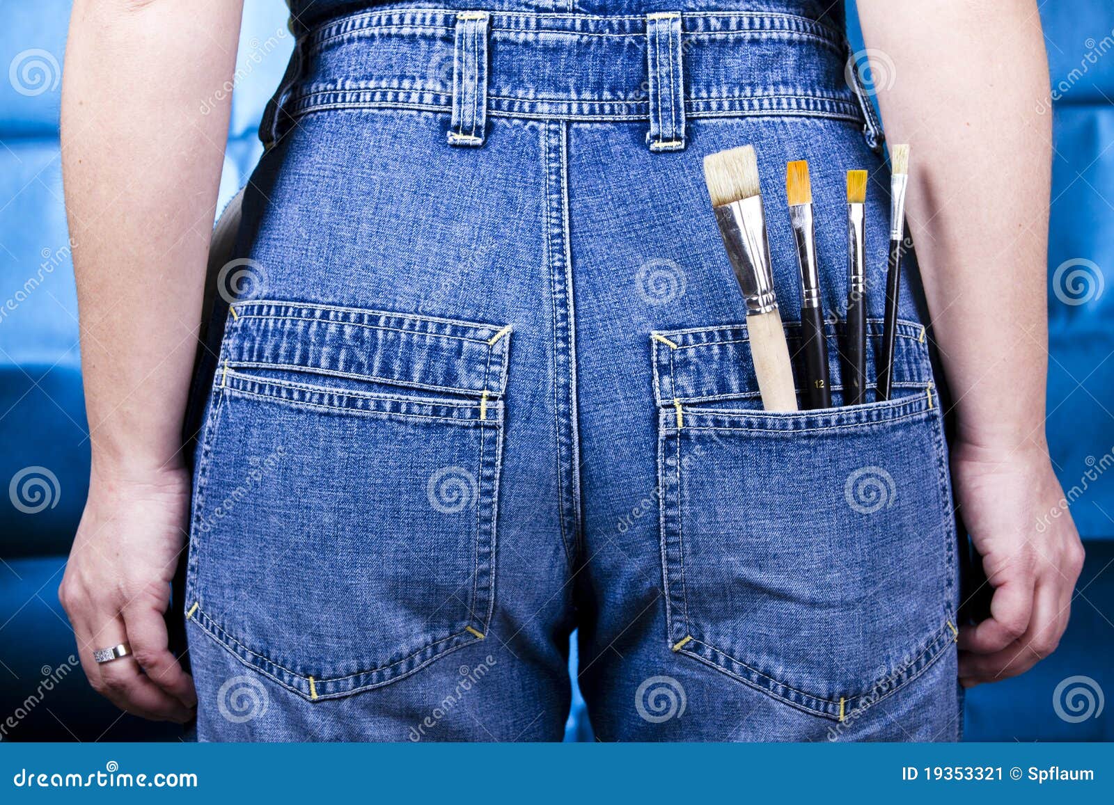 Jeans with paint brushes stock image. Image of draw, blue 19353321