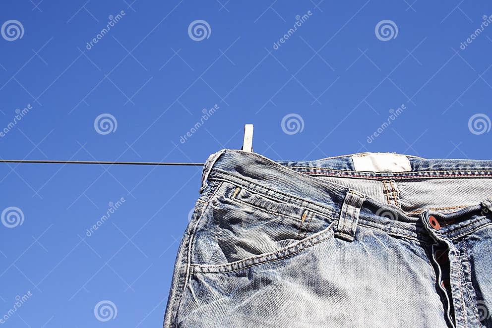 Jeans Pegged To the Wash Line Stock Image - Image of pegged, denim: 3552373