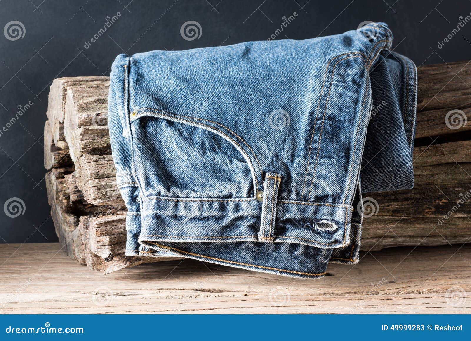 Jeans with tree stump stock image. Image of fabric, denim 49999283