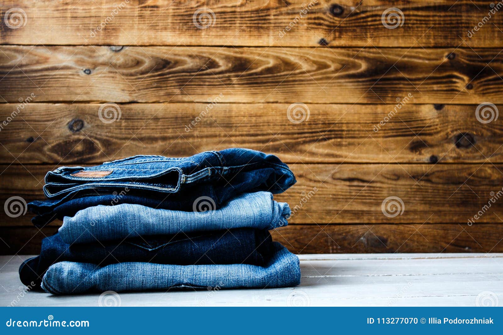 Jeans on a Wooden Background Stock Photo - Image of overhead, casual ...