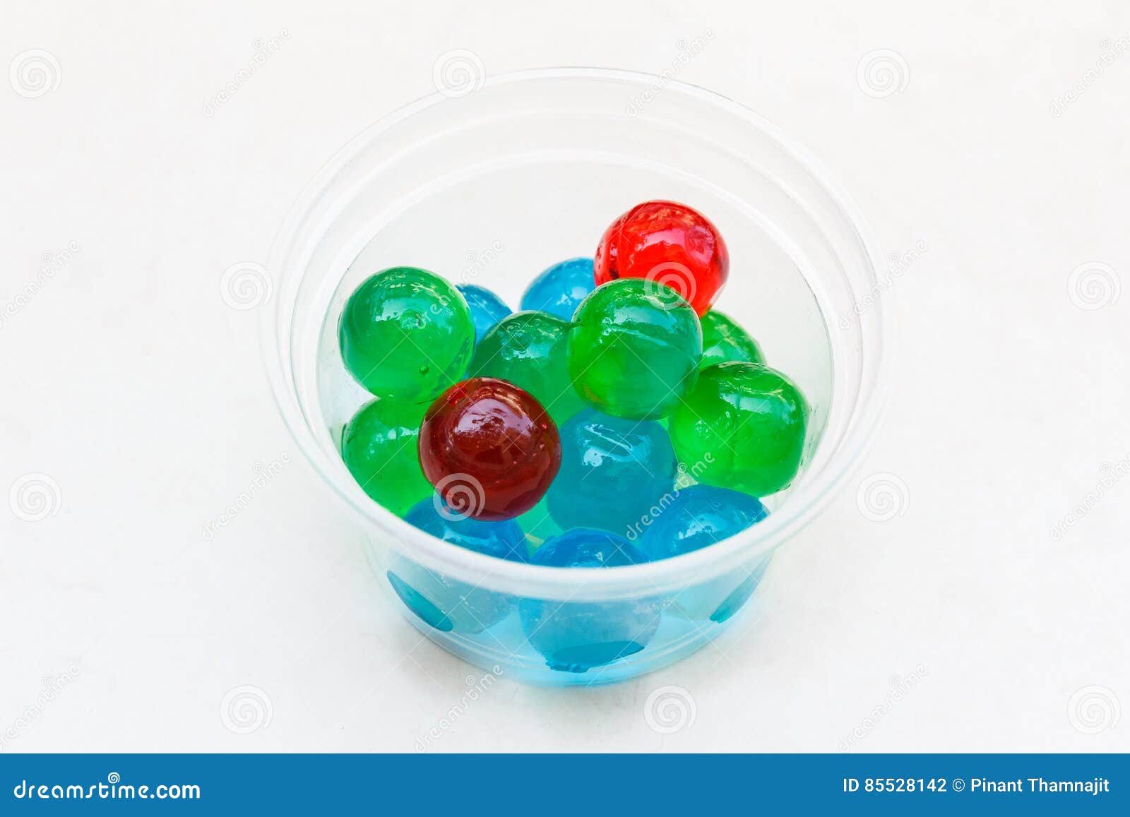 Jelly ball in plastic cup. stock photo. Image of closeup 85528142